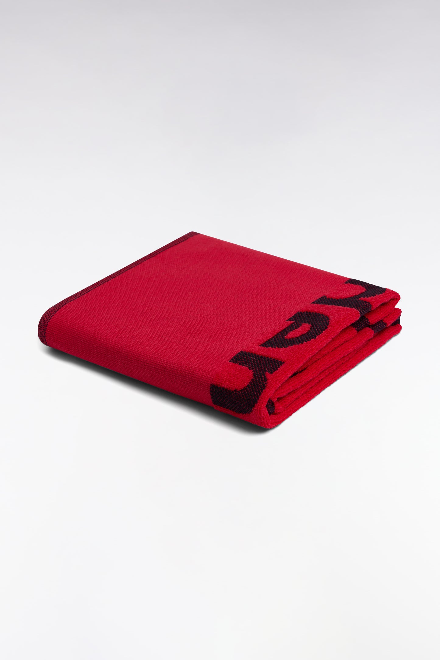 Fuchsia cotton terry beach towel with pink Eden Park jacquard