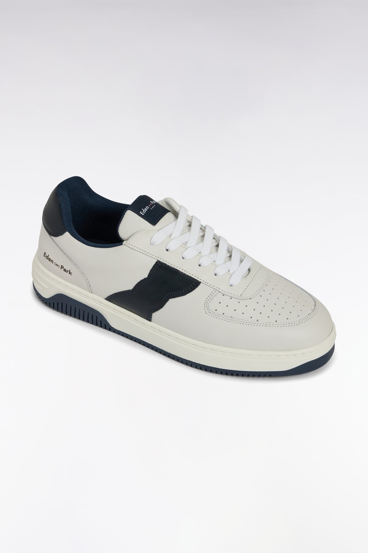 White leather sneakers with black details