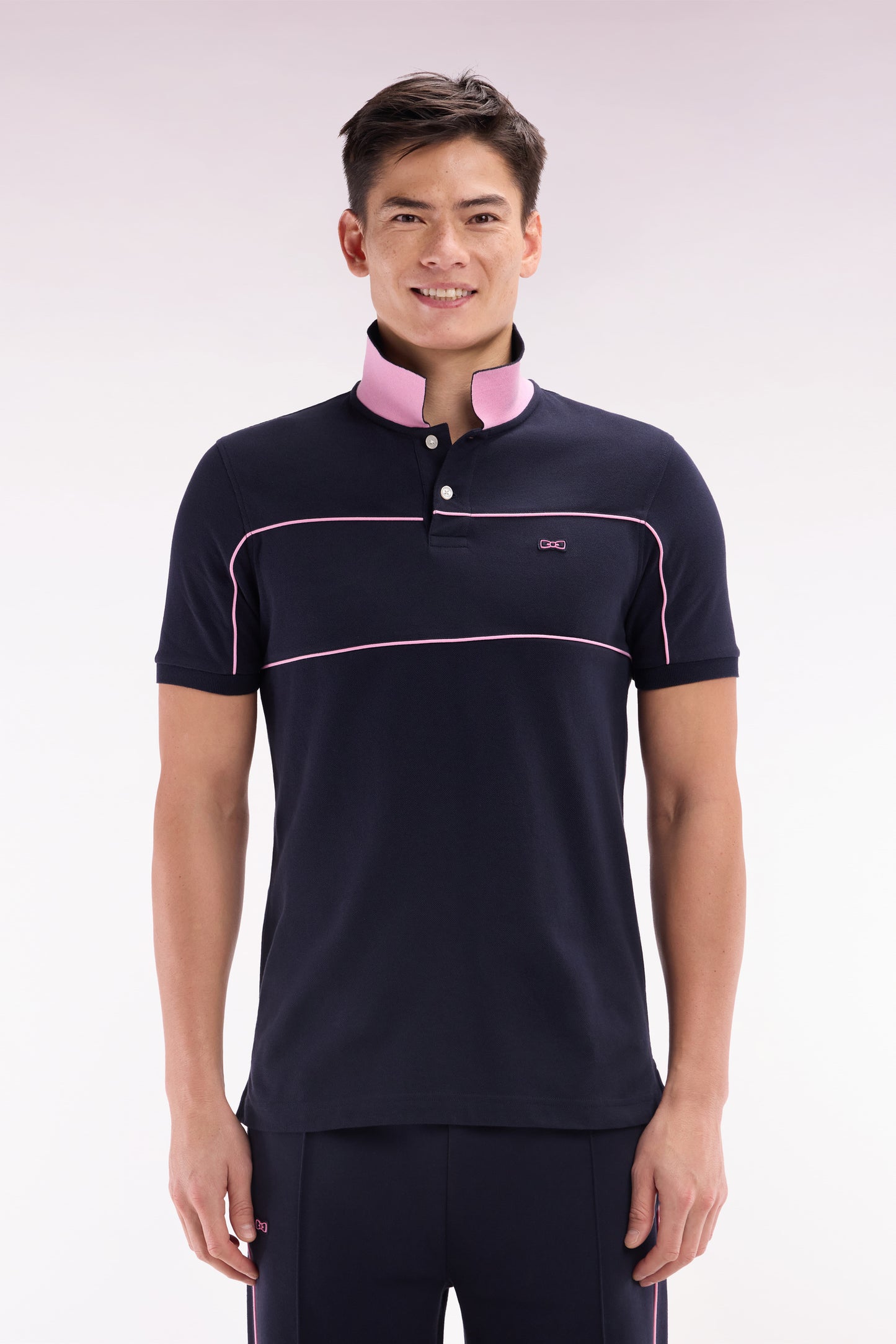 Straight-fit short-sleeved polo shirt in navy cotton piqué with piped cut-outs