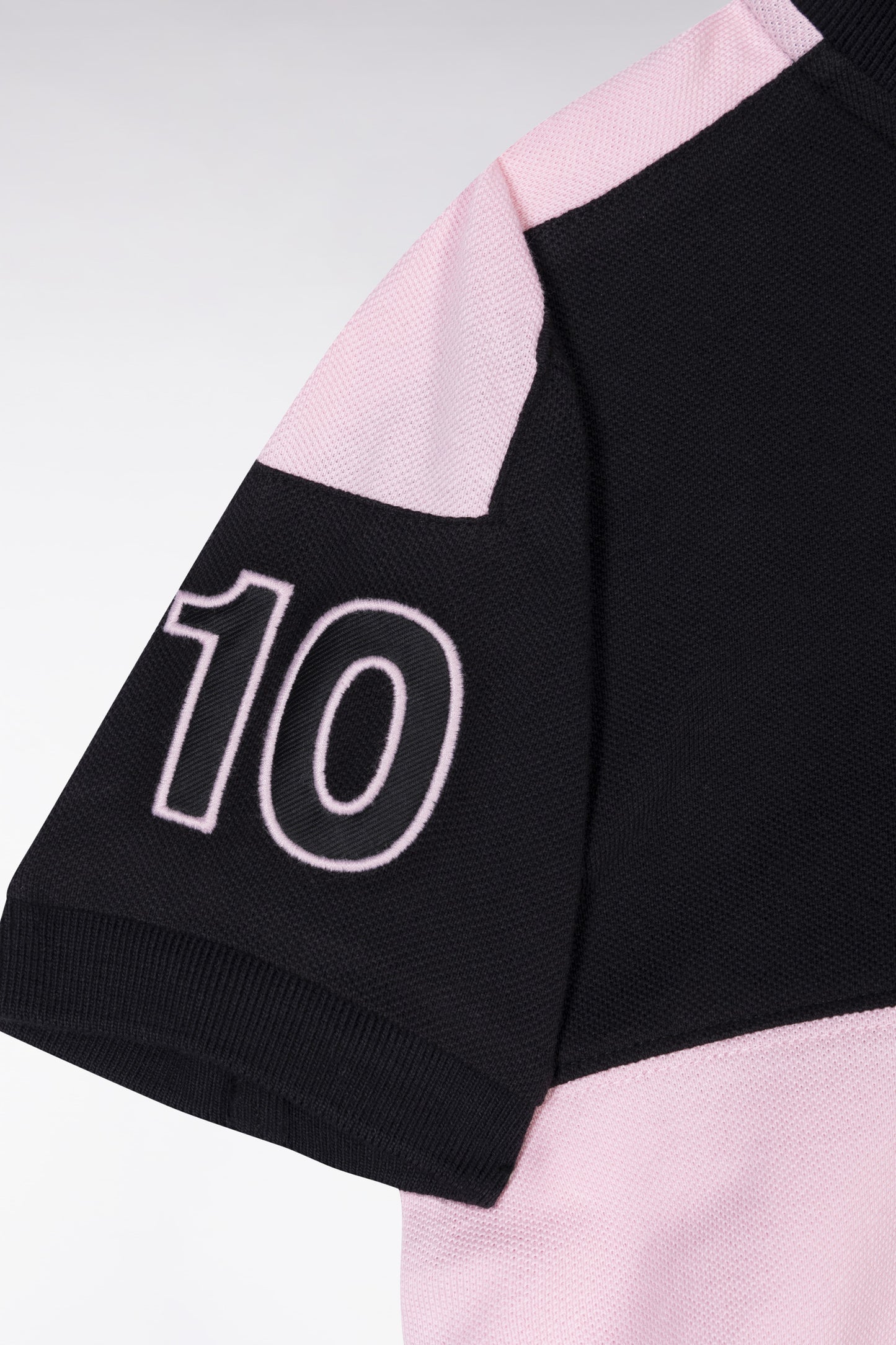 Straight-fit New Zealand polo shirt in black and pink cotton piqué