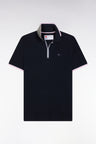 Slim-fit short-sleeved polo shirt in navy stretch cotton with zipped collar