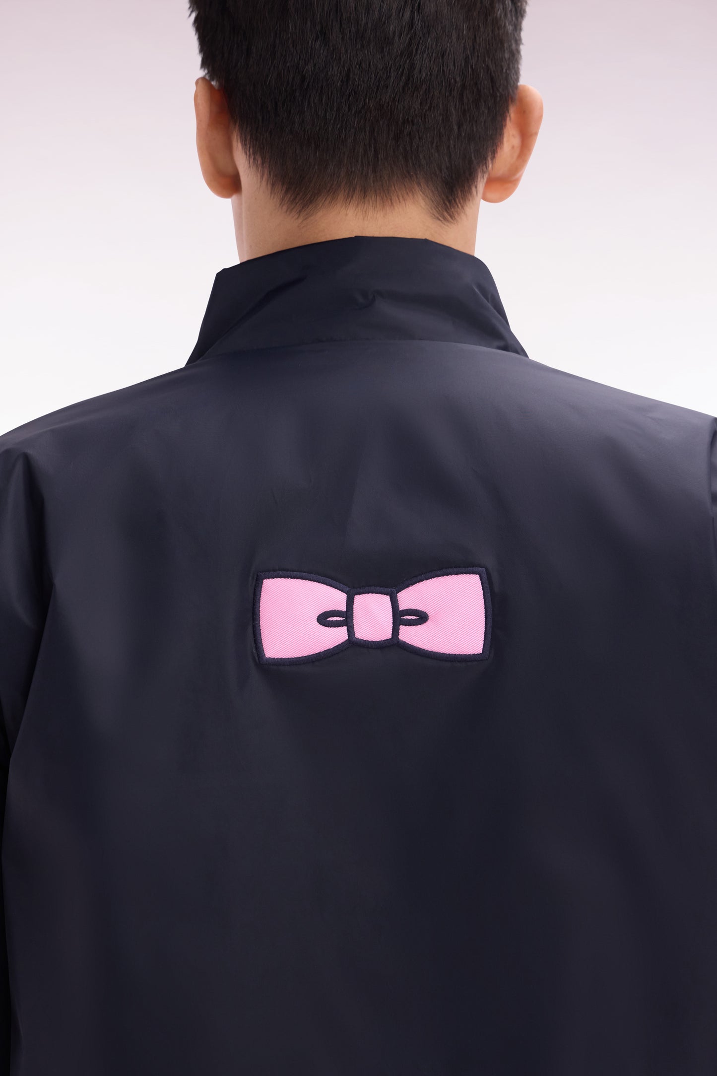 Blouson coupe-vent en polyamide mat marine brodé