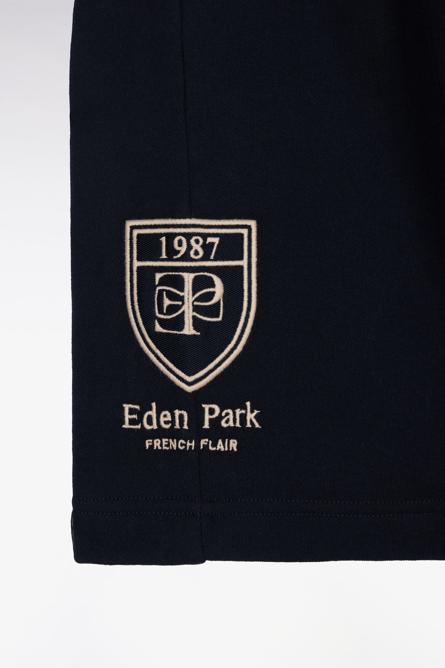 Short en molleton coton marine écusson brodé