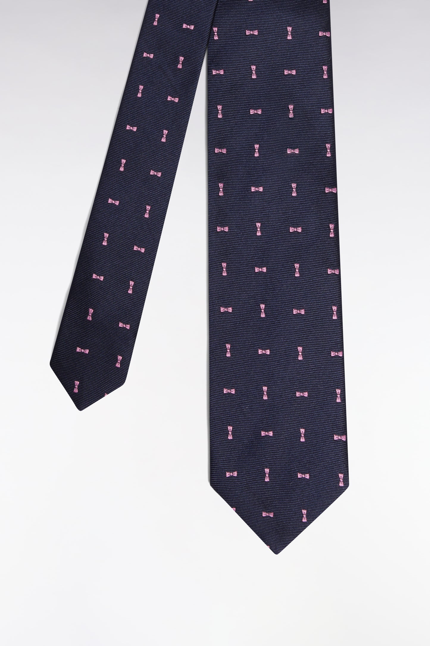 Micropatterned navy silk tie pink bow tie