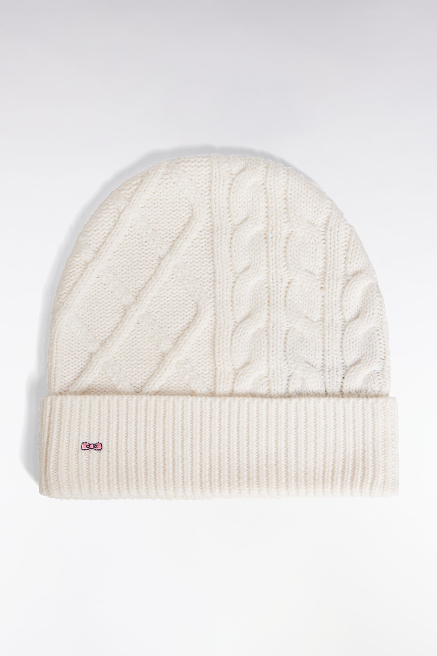 Bonnet à torsades en laine et coton blanc
