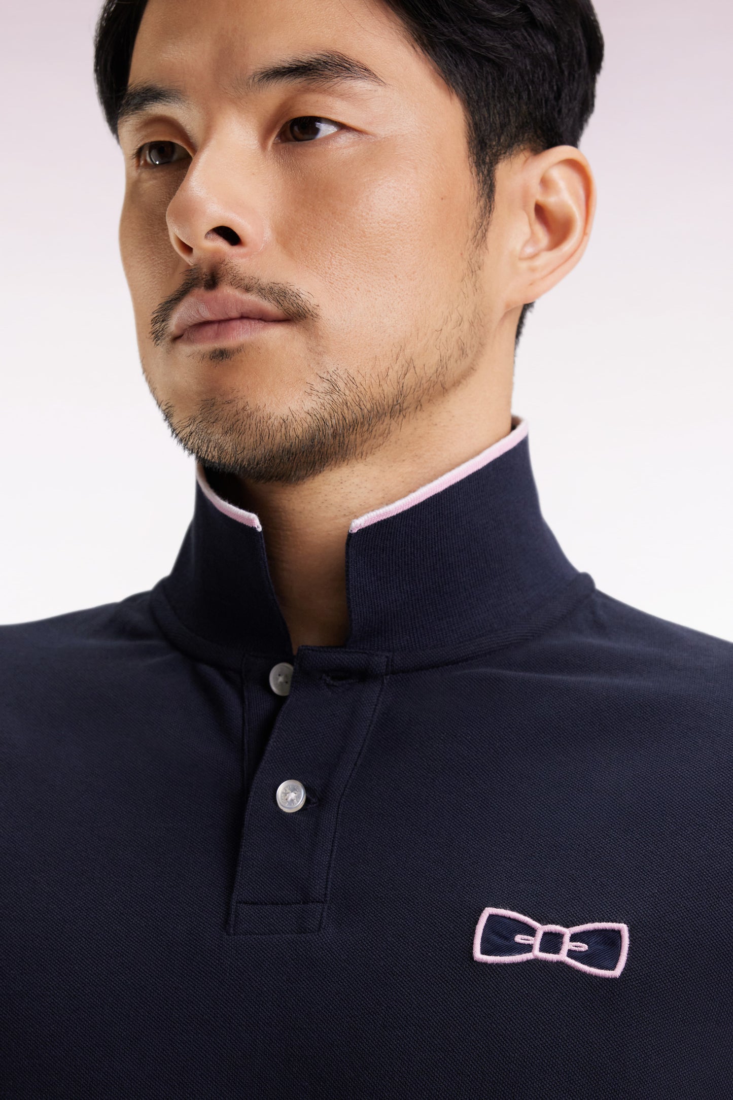 Polo manches courtes roses en piqué coton marine coupe droite