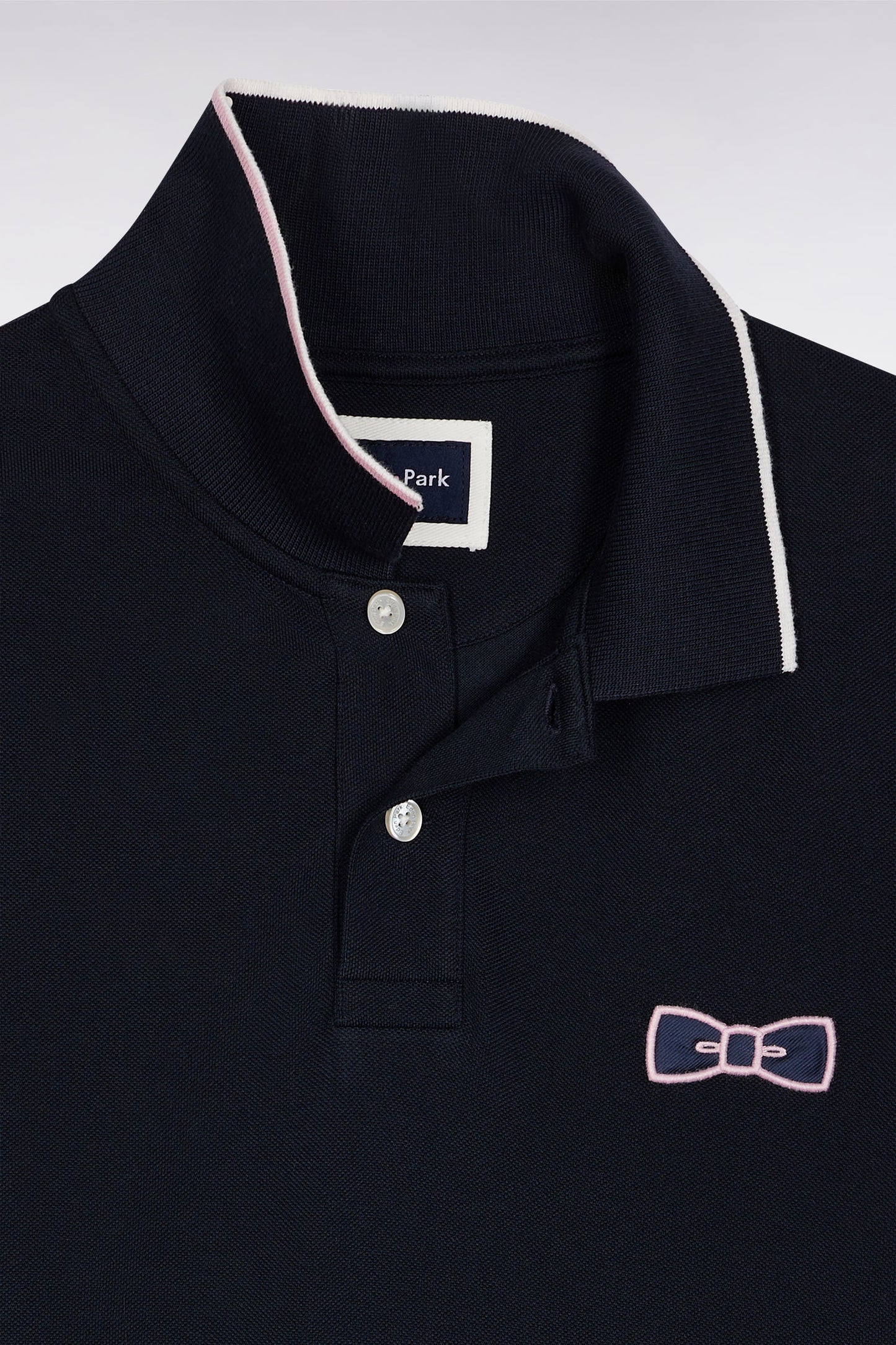 Polo manches courtes roses en piqué coton marine coupe droite