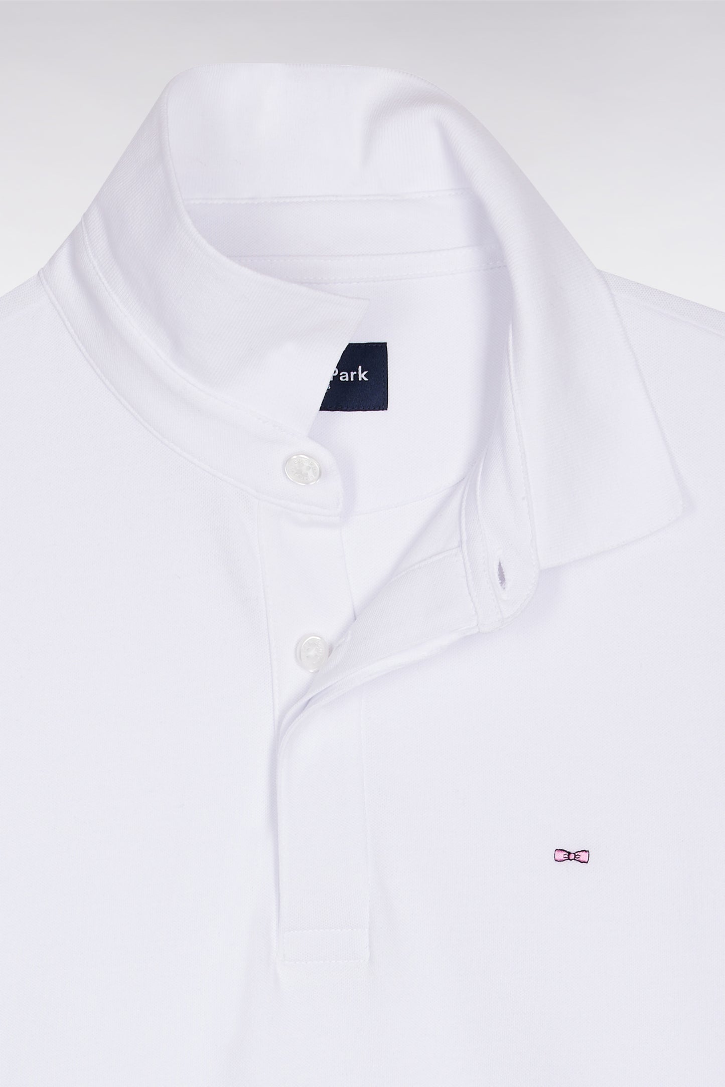 Polo à manches longues en coton stretch blanc coupe slim