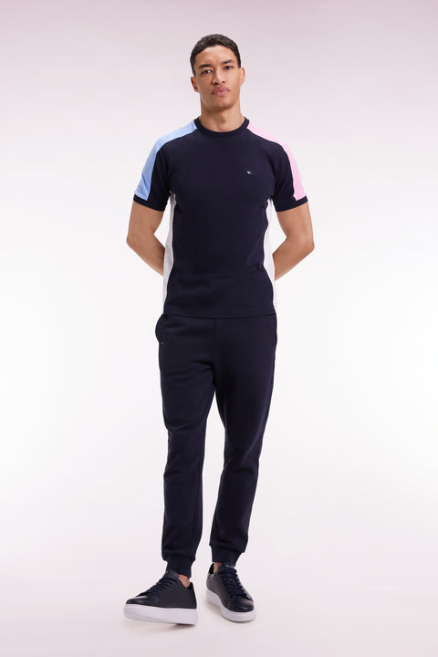 Short-sleeved navy cotton T-shirt with colorful cut-outs - Image 1