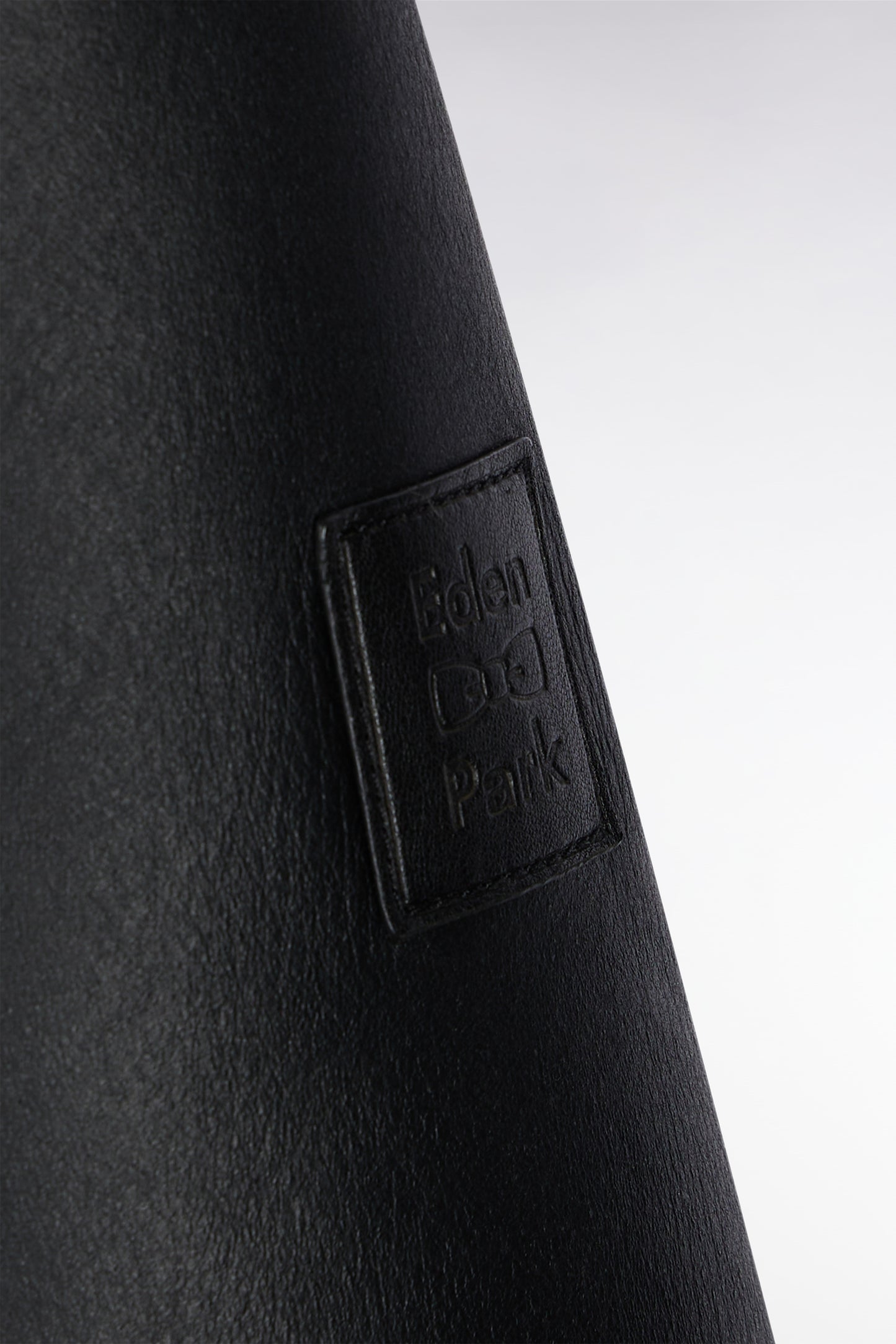 Blouson en peau lainée noir col marron