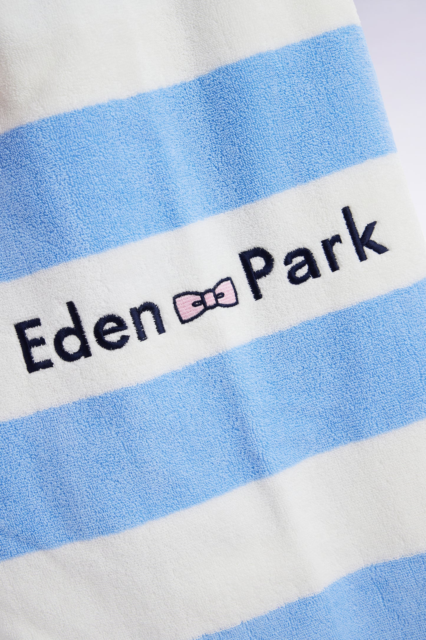 Striped beach towel in sky blue terry cotton