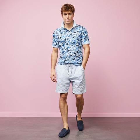 Polo bleu clair en coton piqué imprimé fleurs - Image 1
