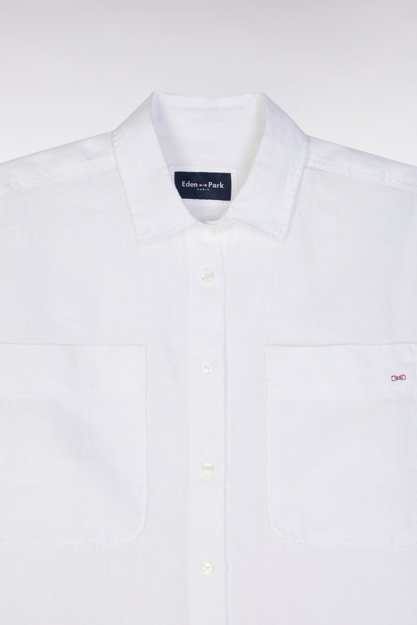 Oversized white linen shirt with patch pockets