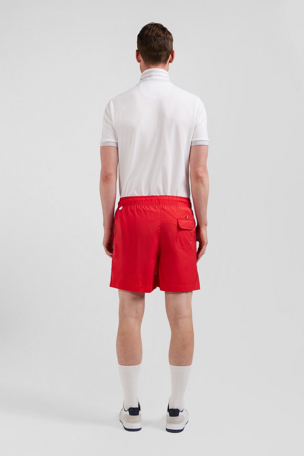 Short de bain uni détail bandes tricolores