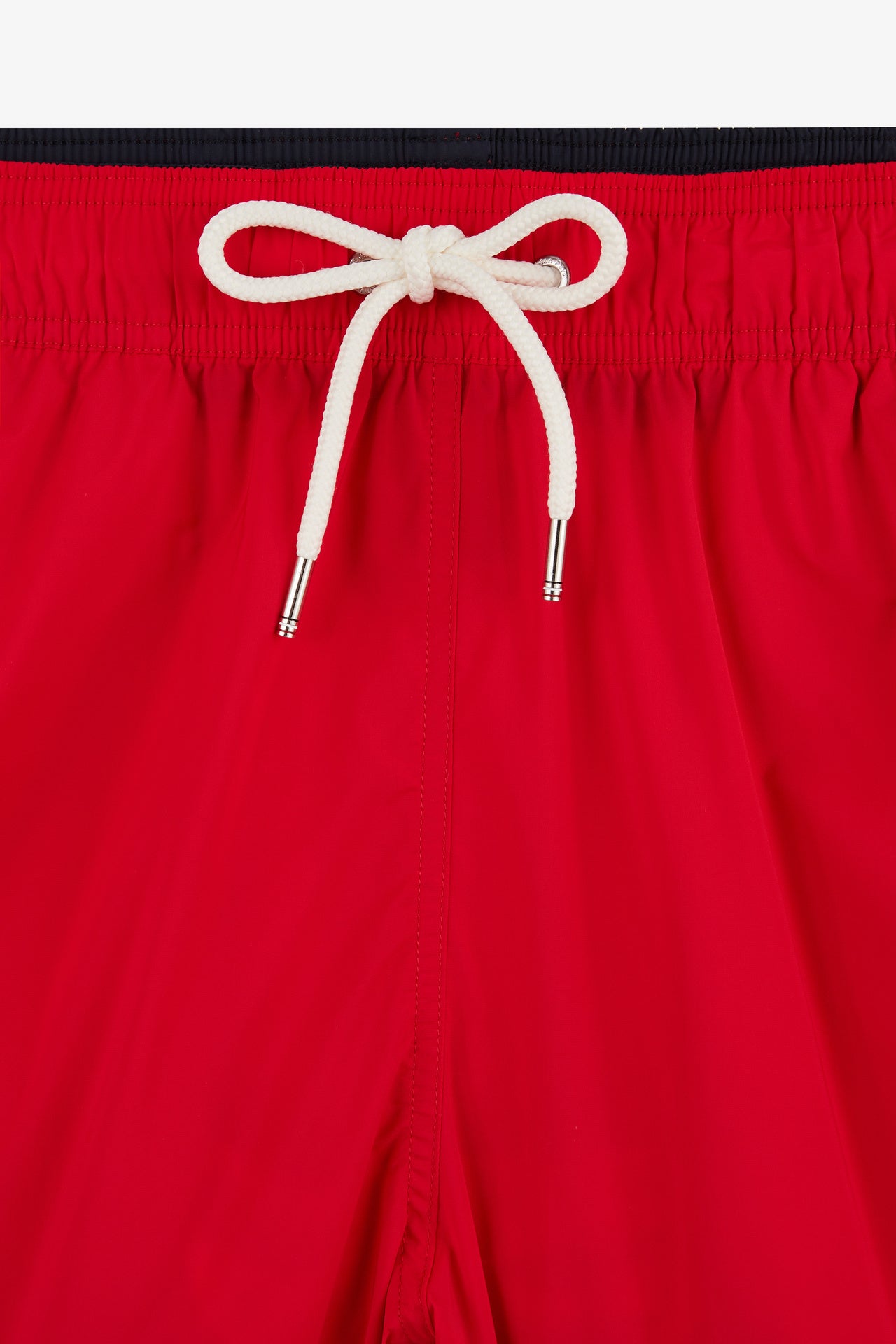Short de bain uni détail bandes tricolores