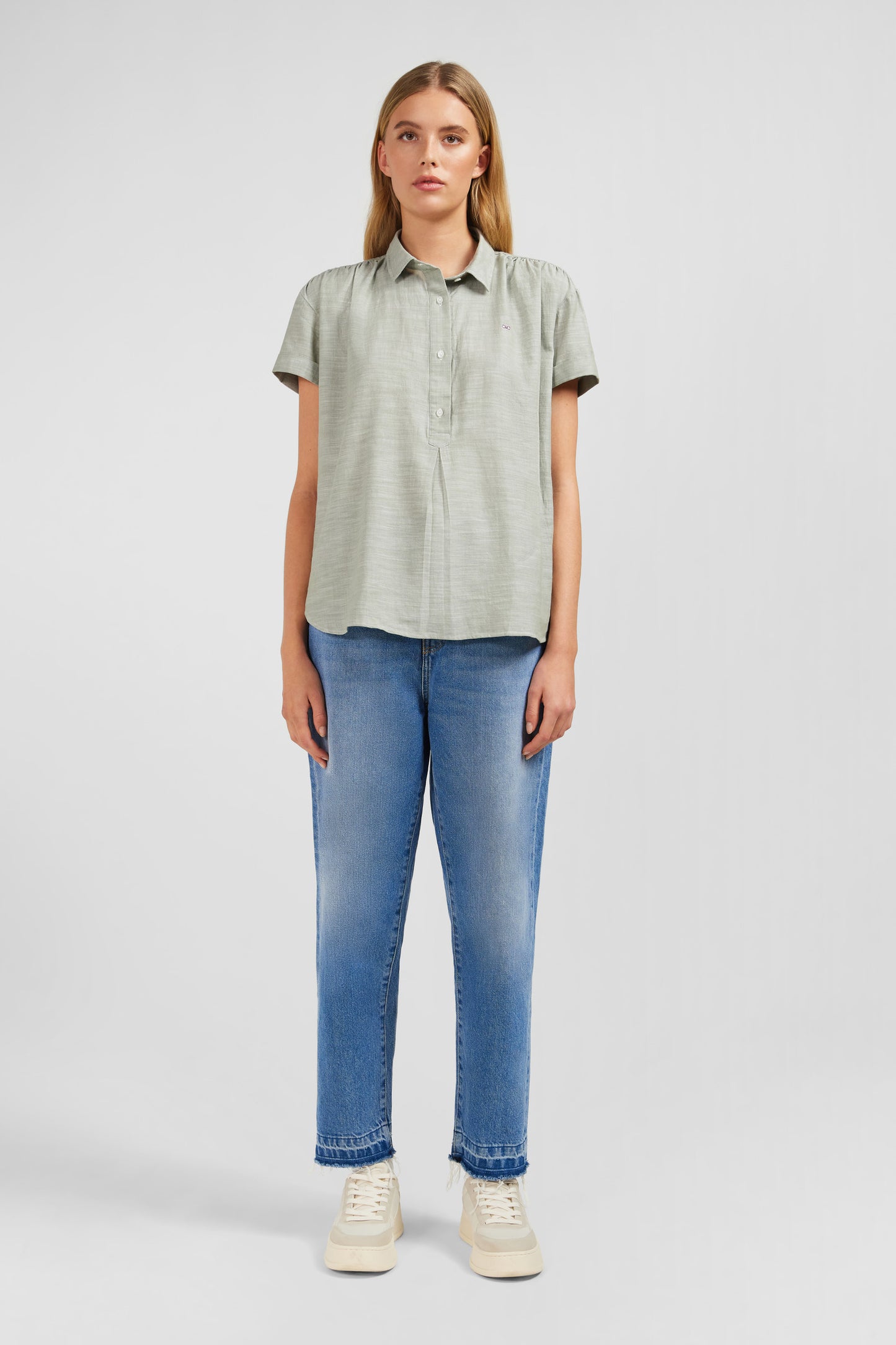 Green short-sleeved blouse