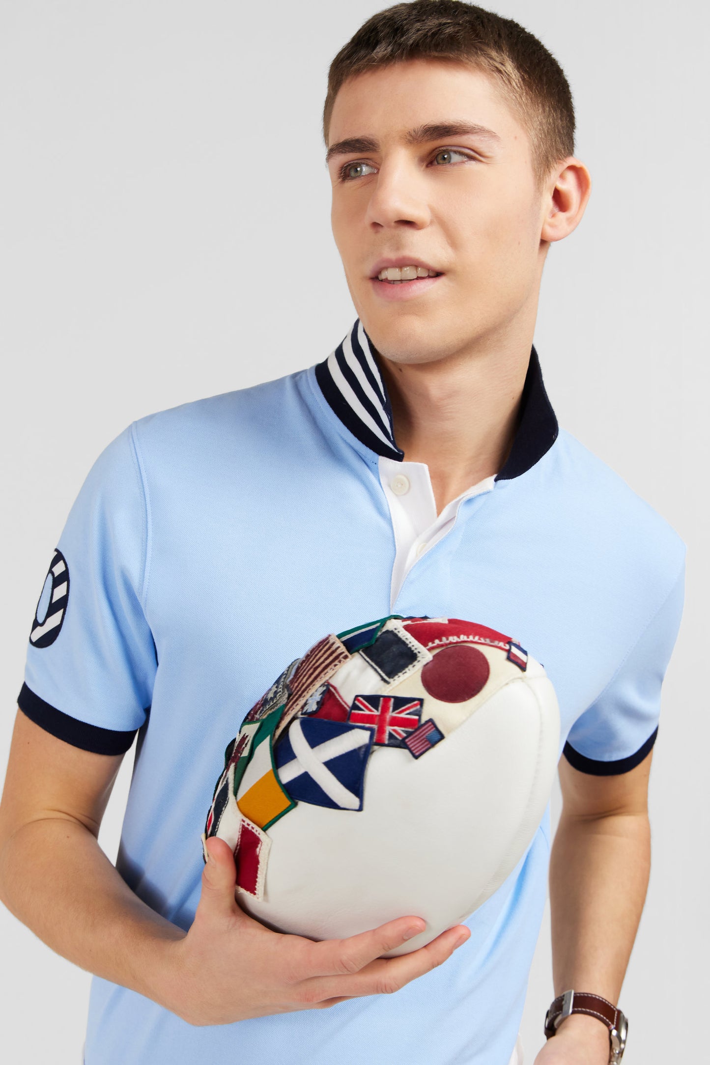 Light blue short-sleeved polo shirt number 10