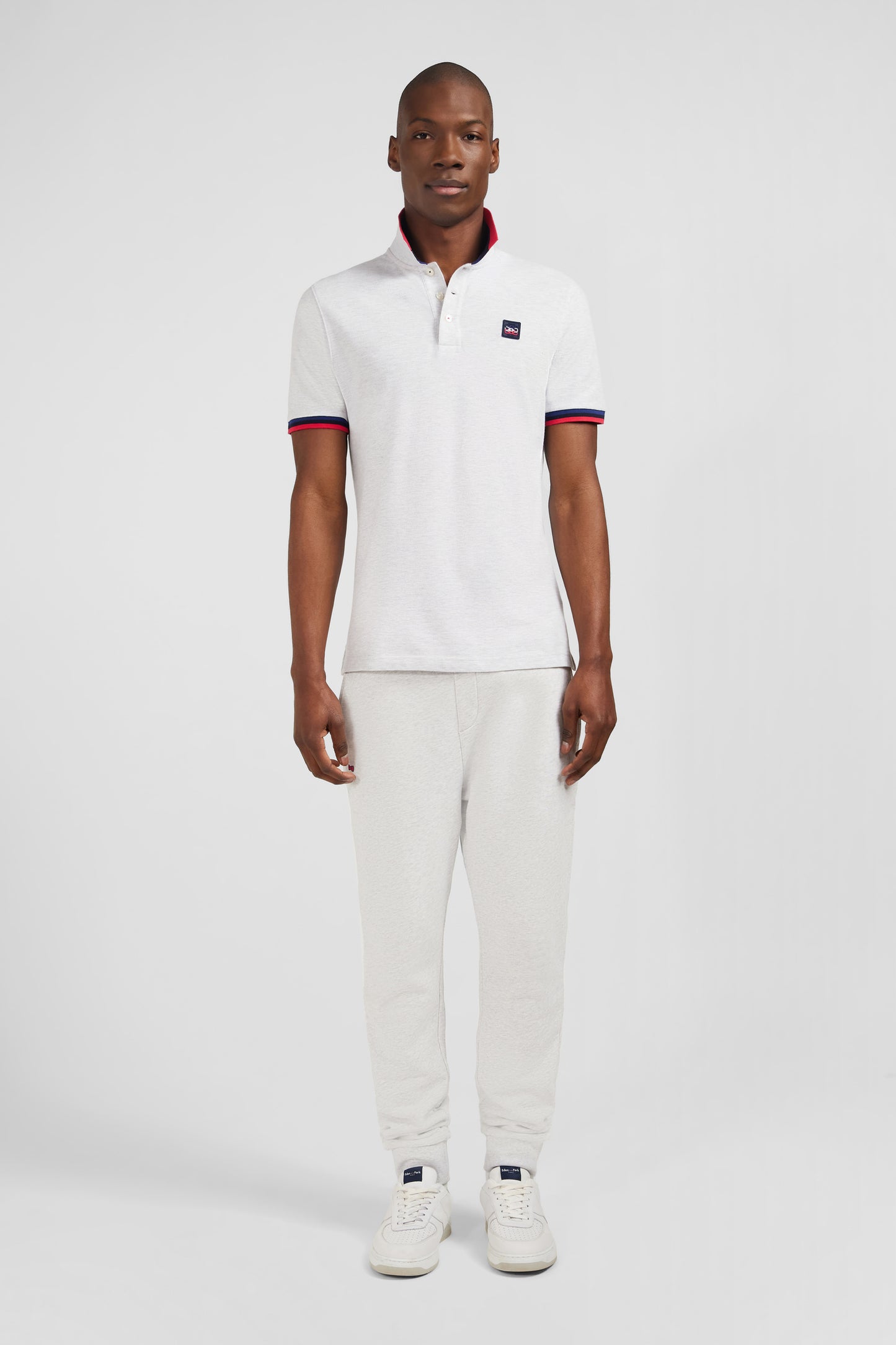 Polo gris à détails tricolores