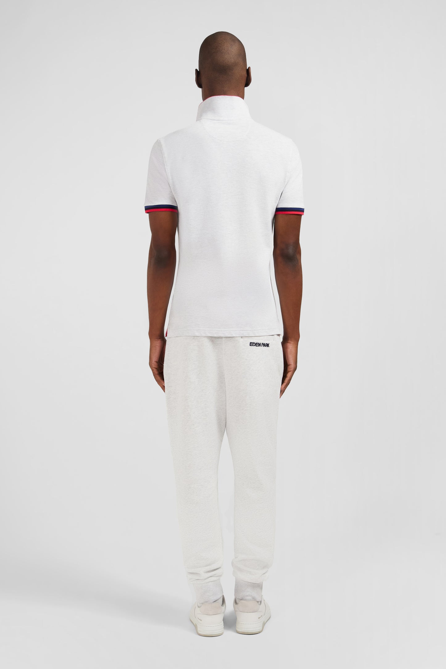 Polo gris à détails tricolores