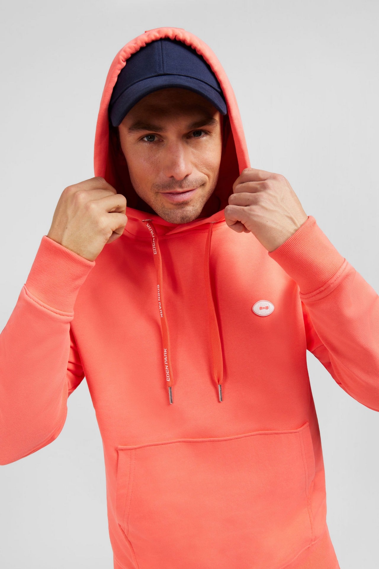 Sweat rose saumon uni à capuche