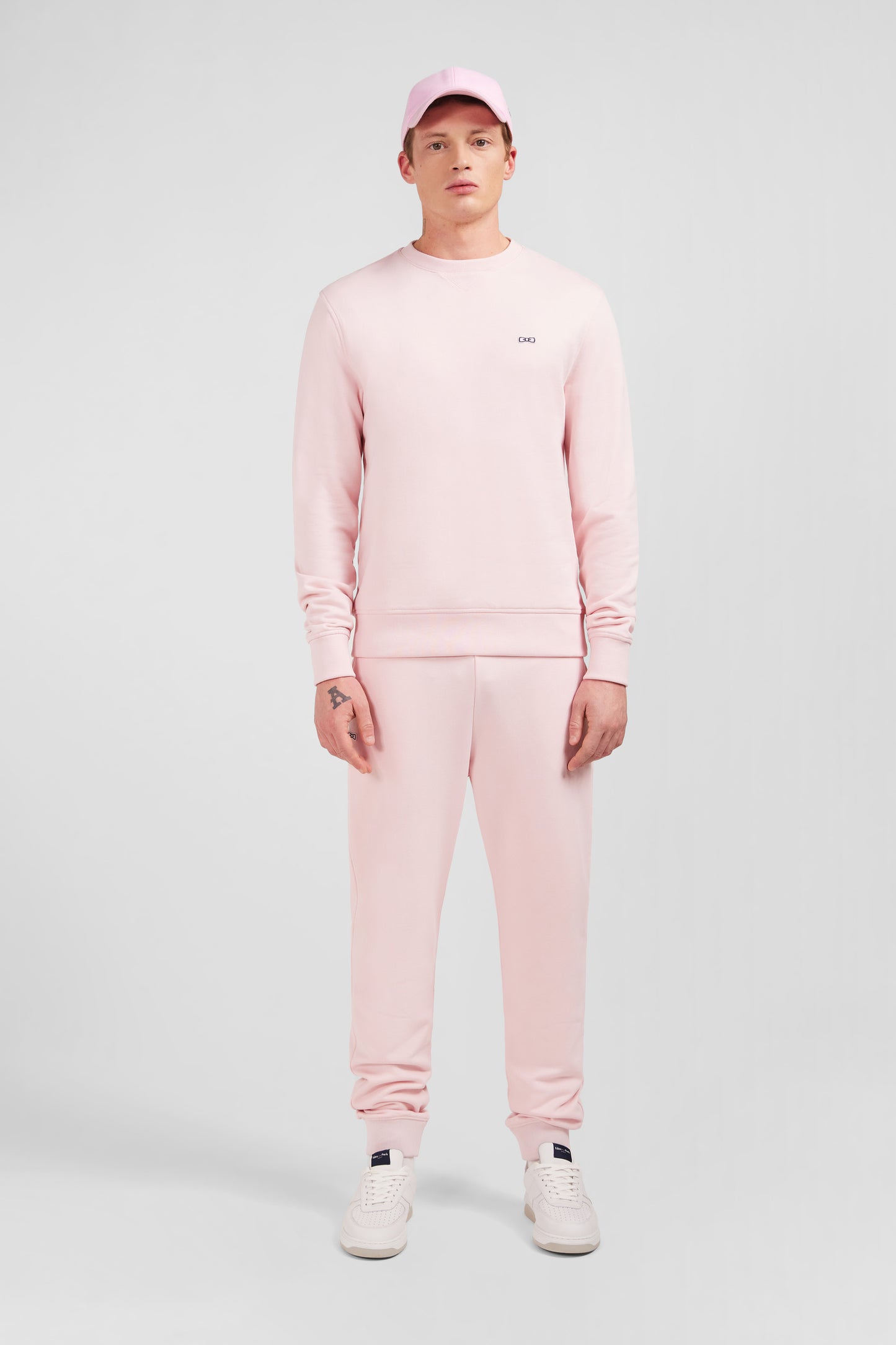 Pink fleece round-neck sweatshirt with bow tie embroidery
