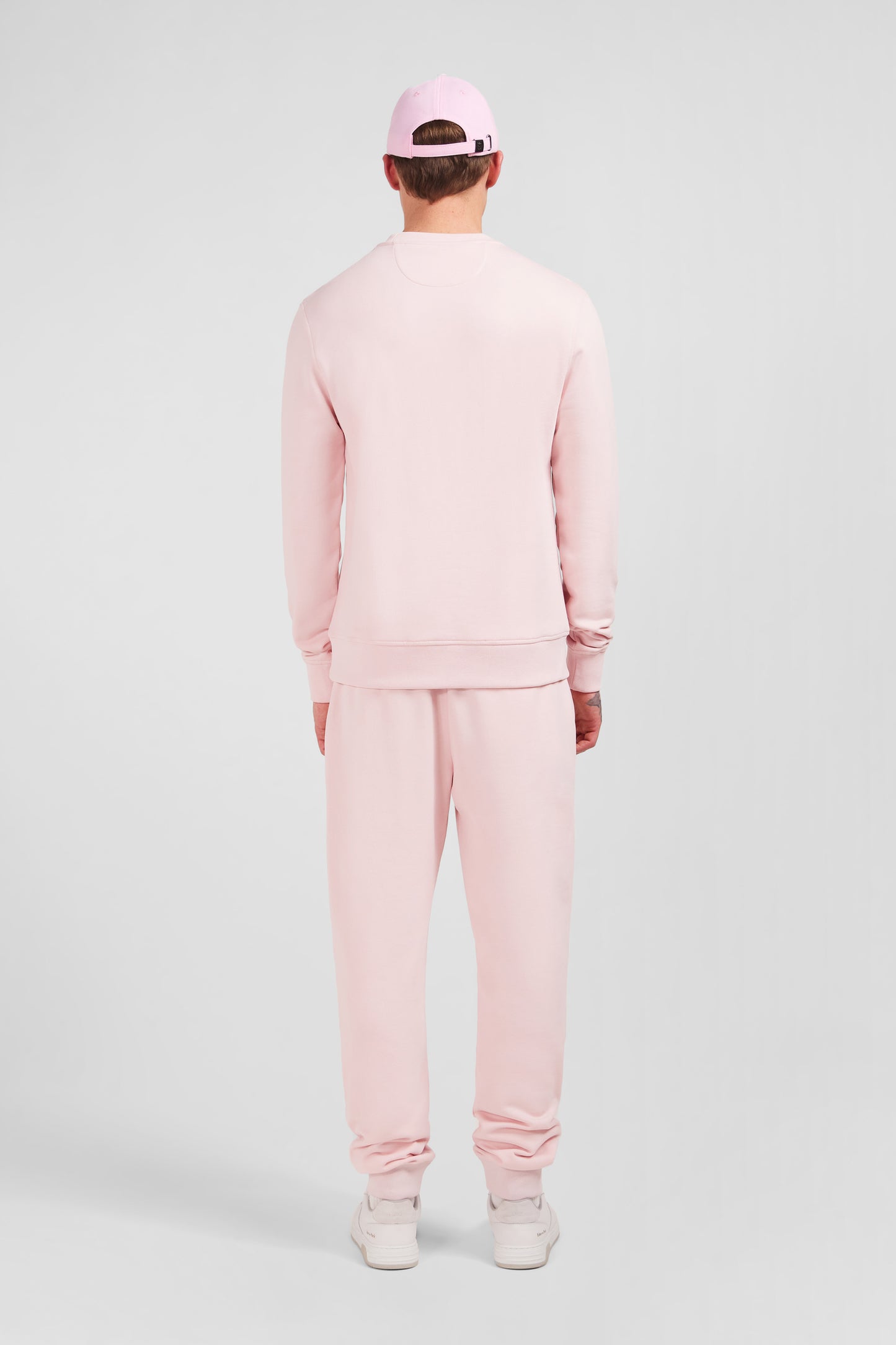 Pink fleece round-neck sweatshirt with bow tie embroidery