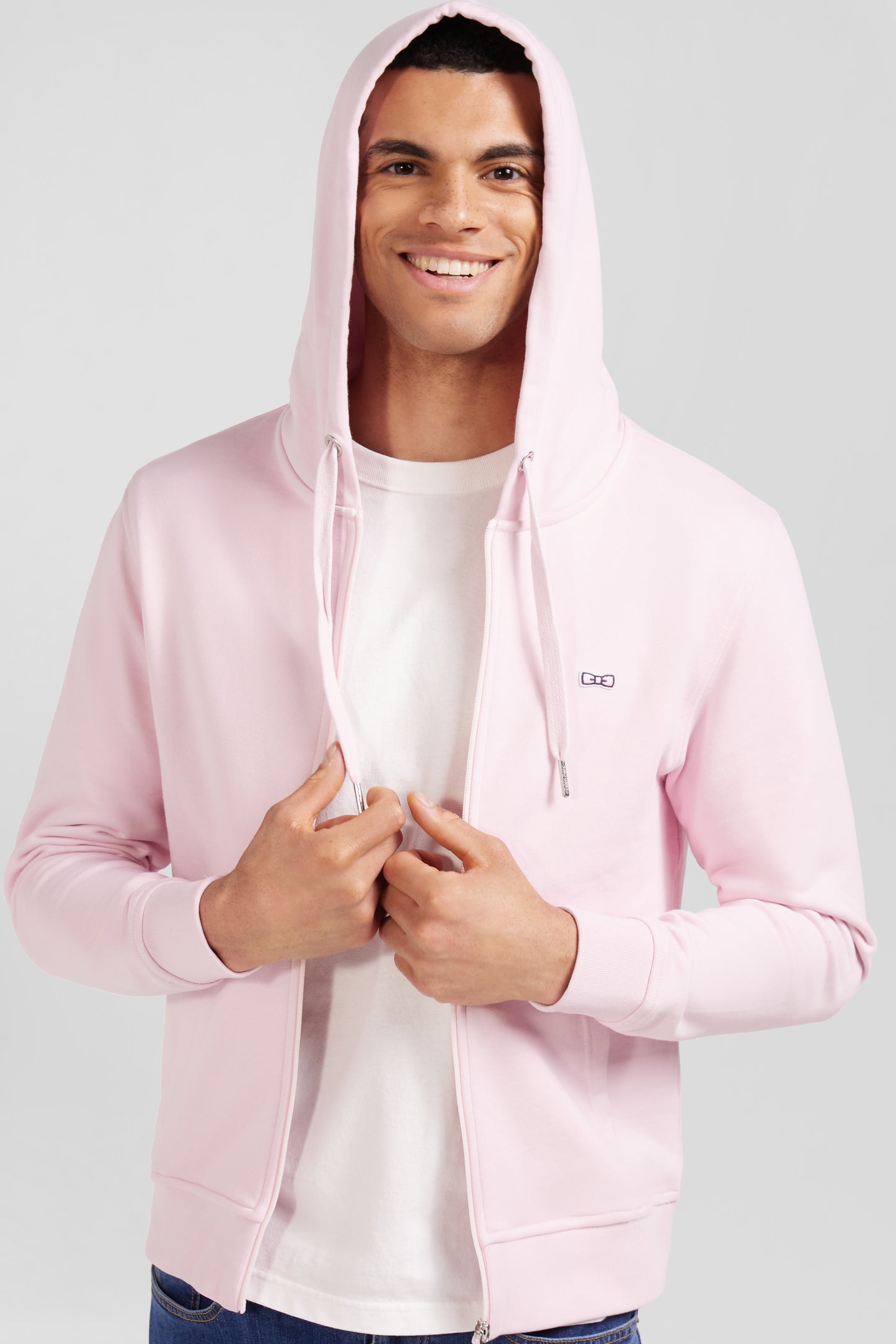 Pink fleece zipped hoodie with bow tie embroidery