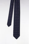 Navy silk tie with pink bow tie pattern