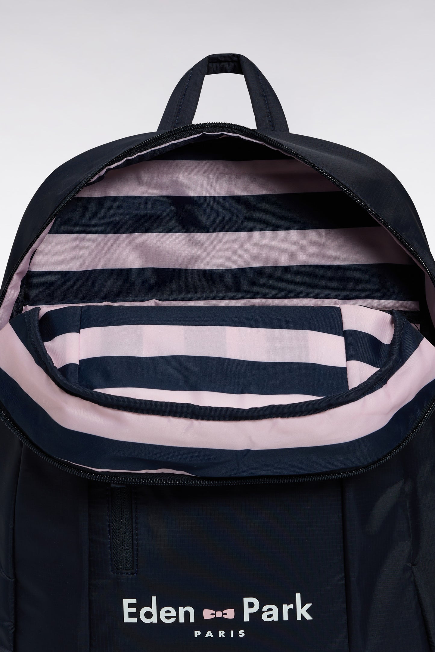 Navy blue backpack with Eden Park logo