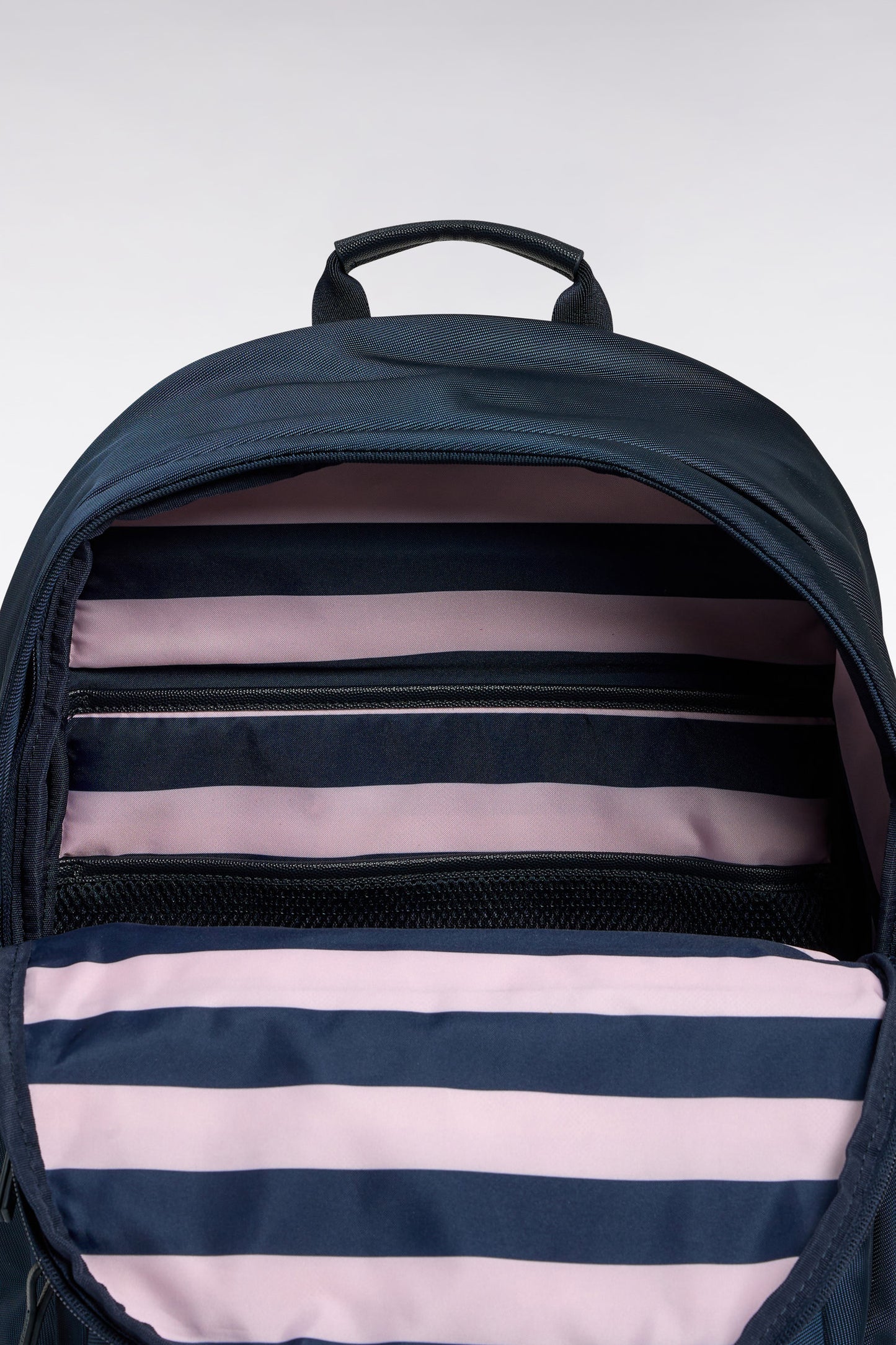 Canvas and black leather backpack