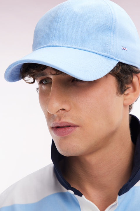 Sky blue cotton piqué cap with bow tie embroidery - Image 1