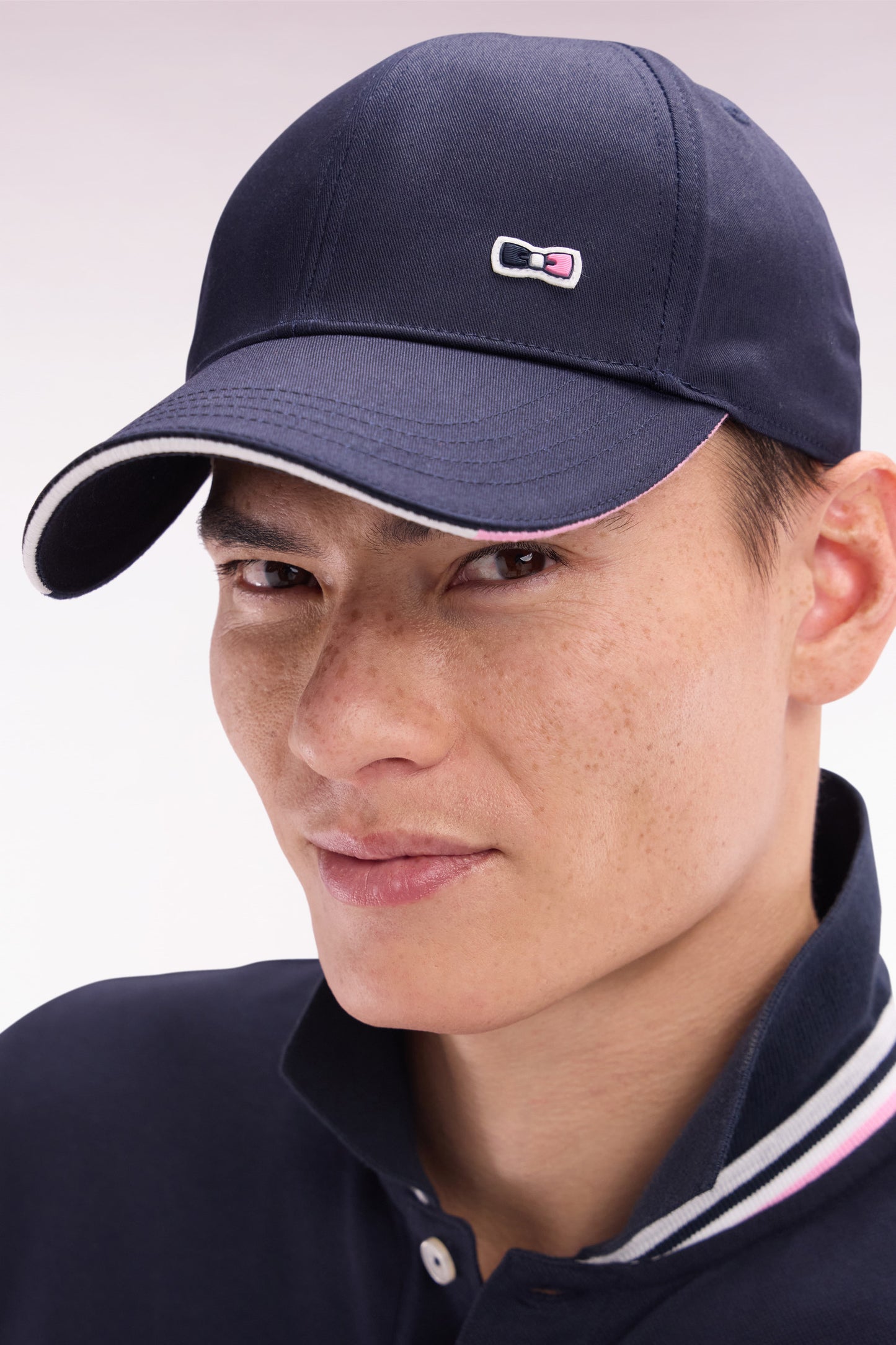 Navy cotton twill cap with piped visor