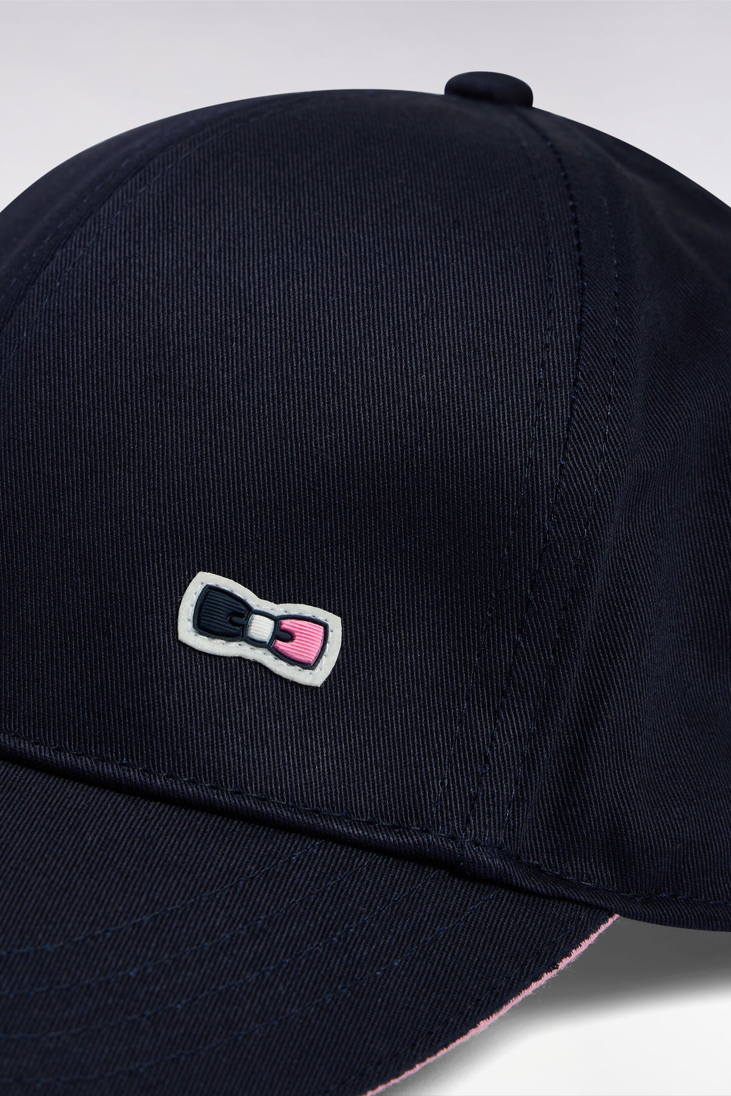 Navy cotton twill cap with piped visor