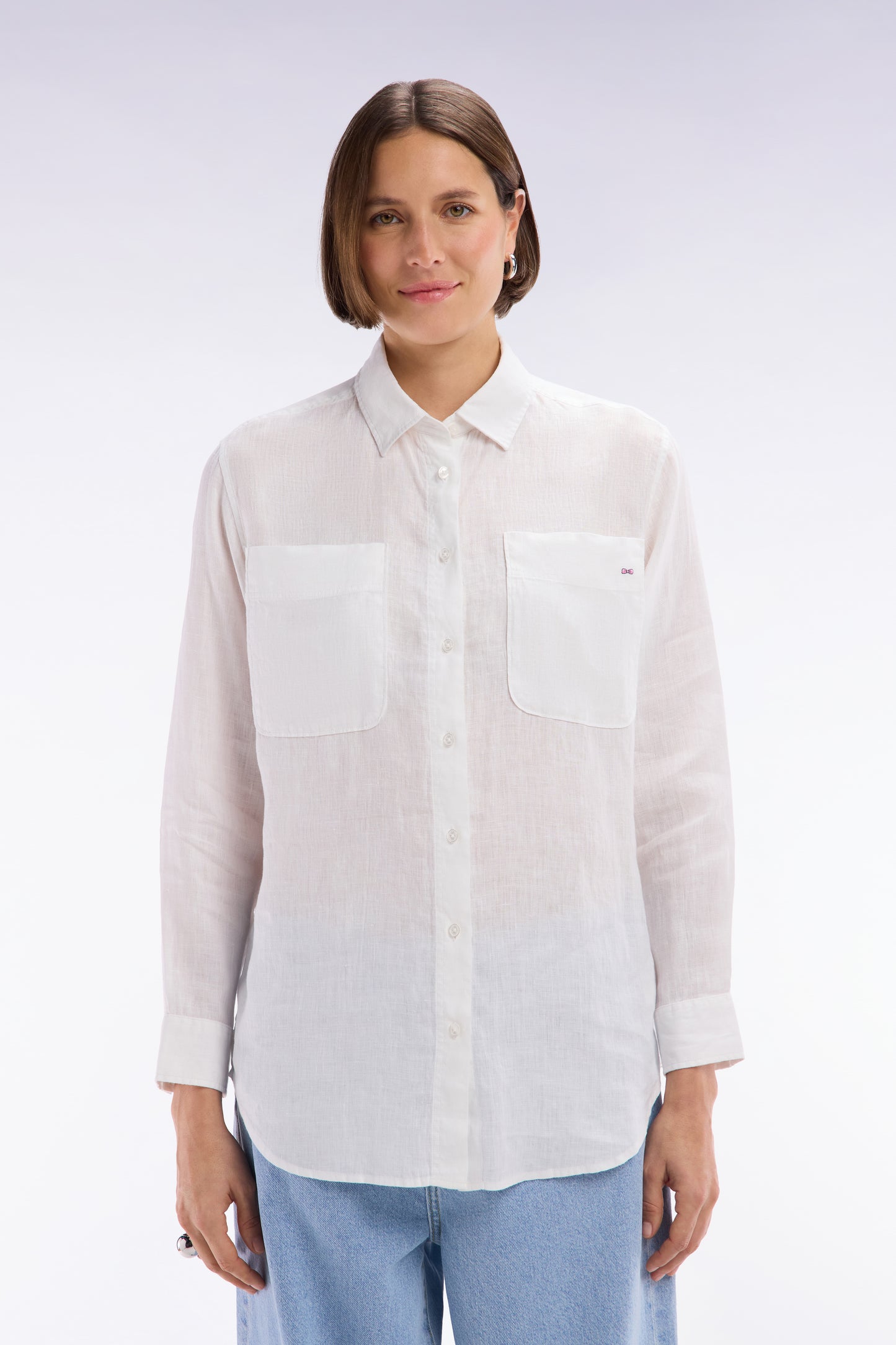 Oversized white linen shirt with patch pockets