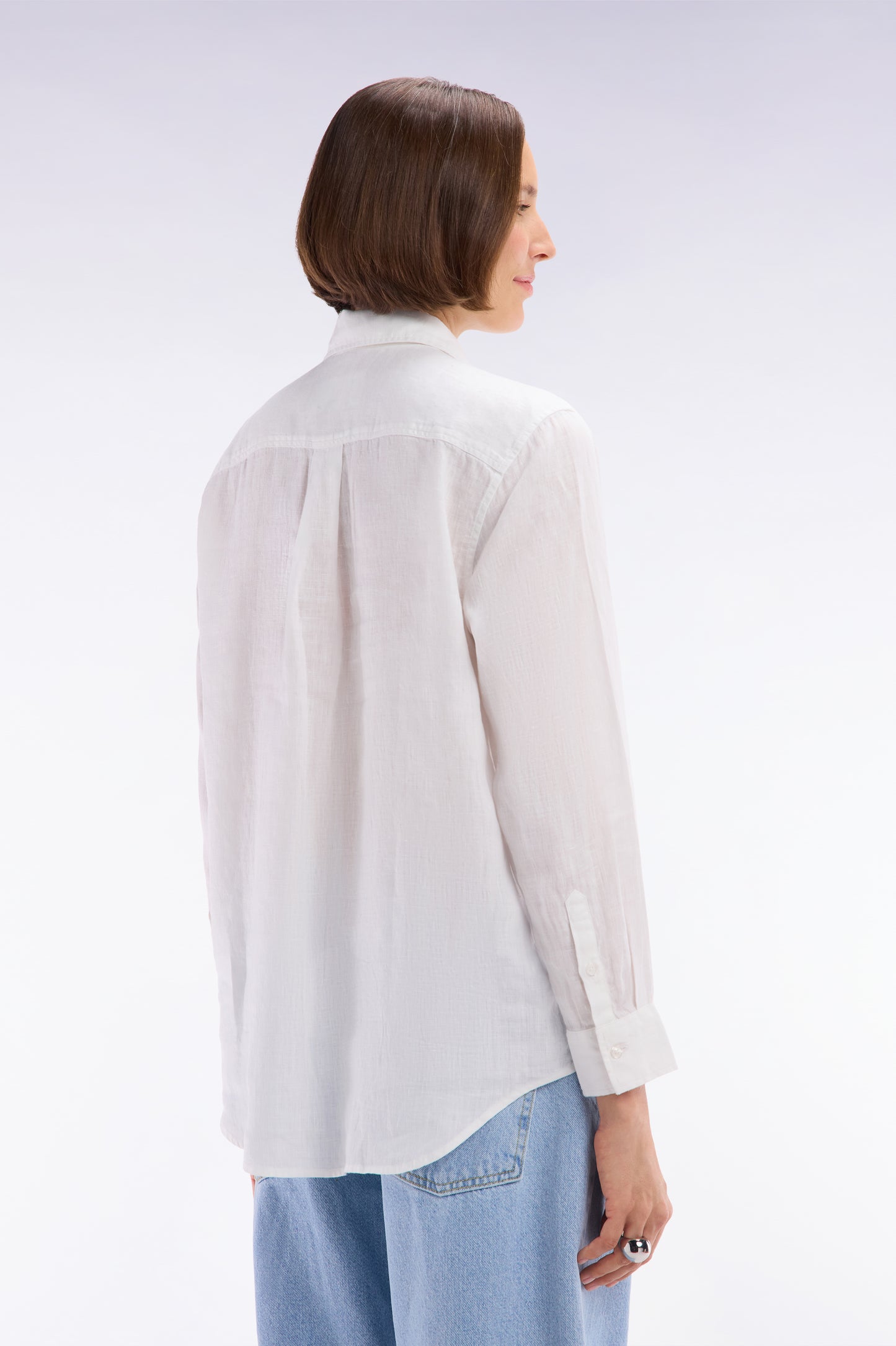 Oversized white linen shirt with patch pockets