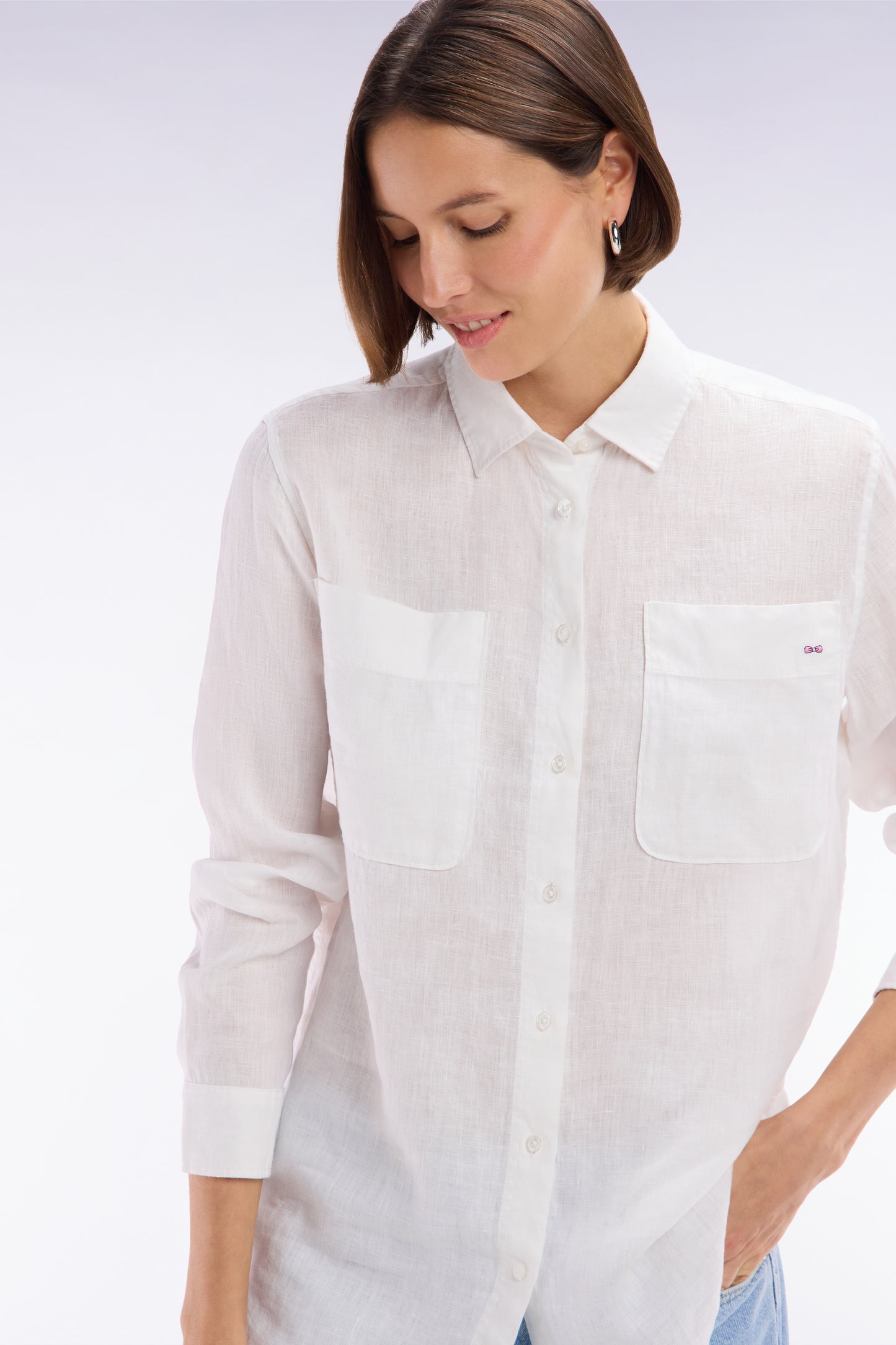 Oversized white linen shirt with patch pockets