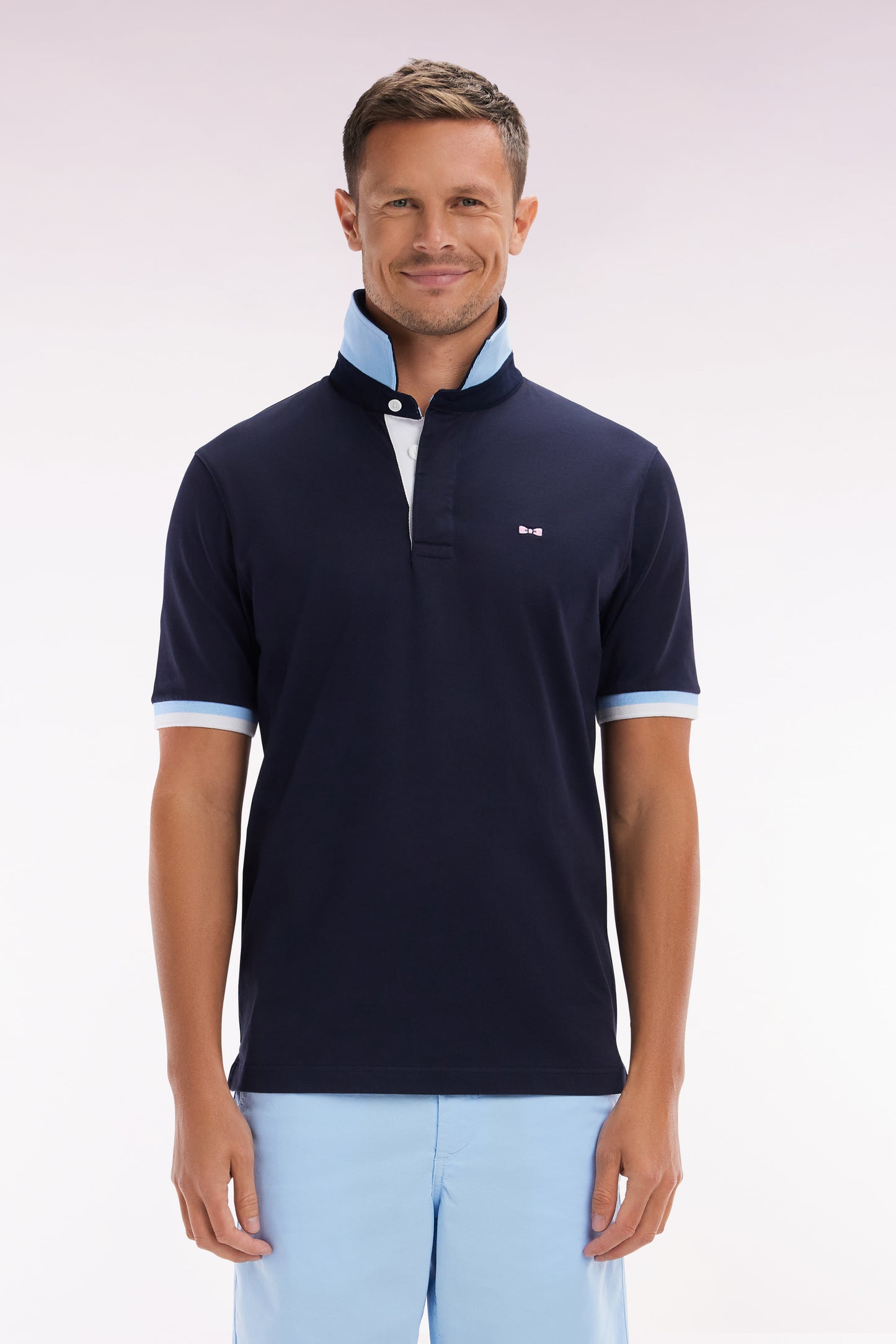 Straight-cut short-sleeved rugby shirt in navy cotton jersey with bow tie embroidery