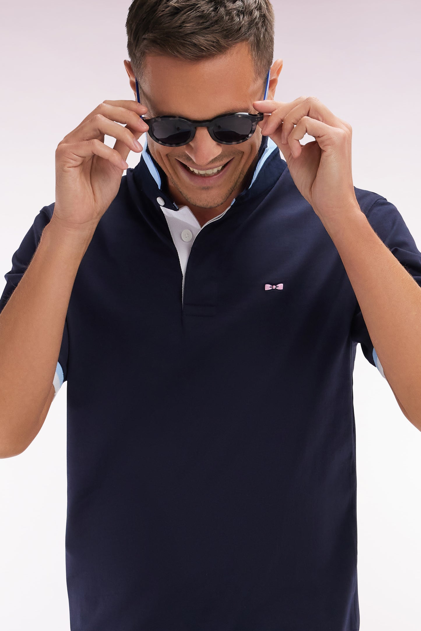 Straight-cut short-sleeved rugby shirt in navy cotton jersey with bow tie embroidery