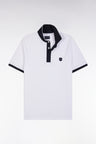 Polo uni à manches courtes en coton stretch blanc passepoil contrasté coupe ajustée