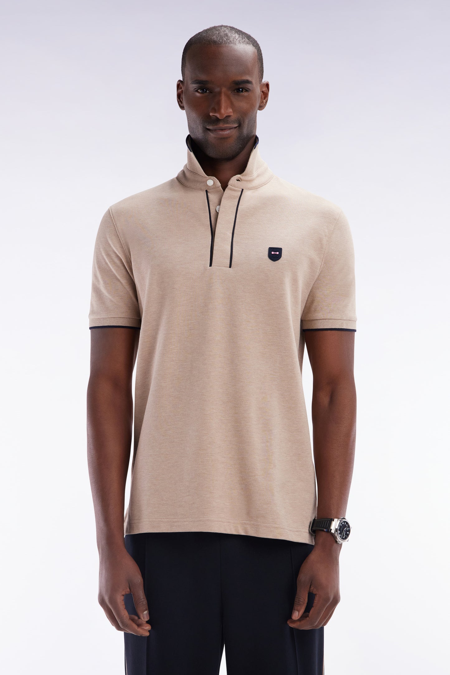 Polo à manches courtes en piqué de coton chiné stretch beige coupe ajustée