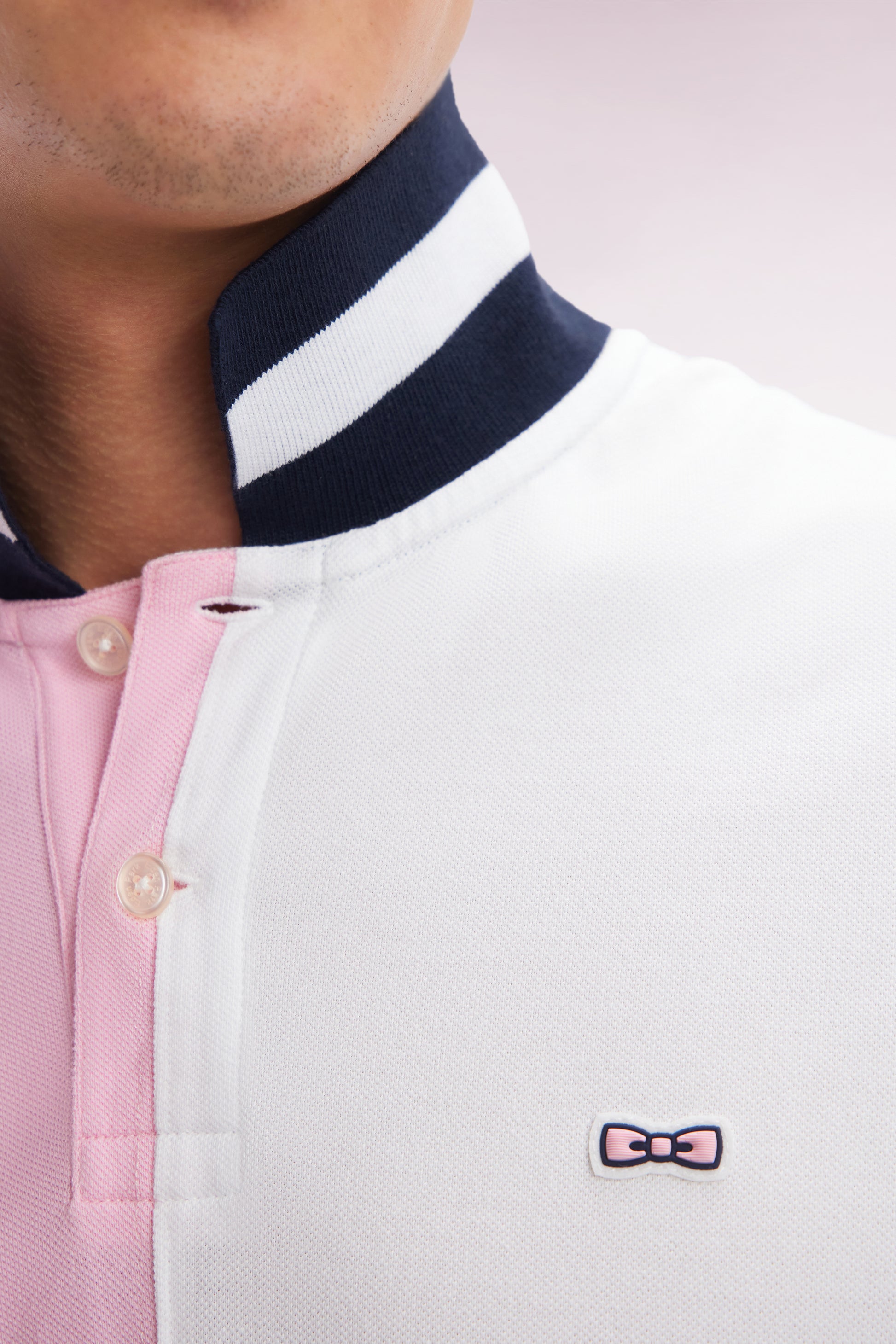 Polo à manches courtes en coton bicolore rose et blanc coupe décontractée