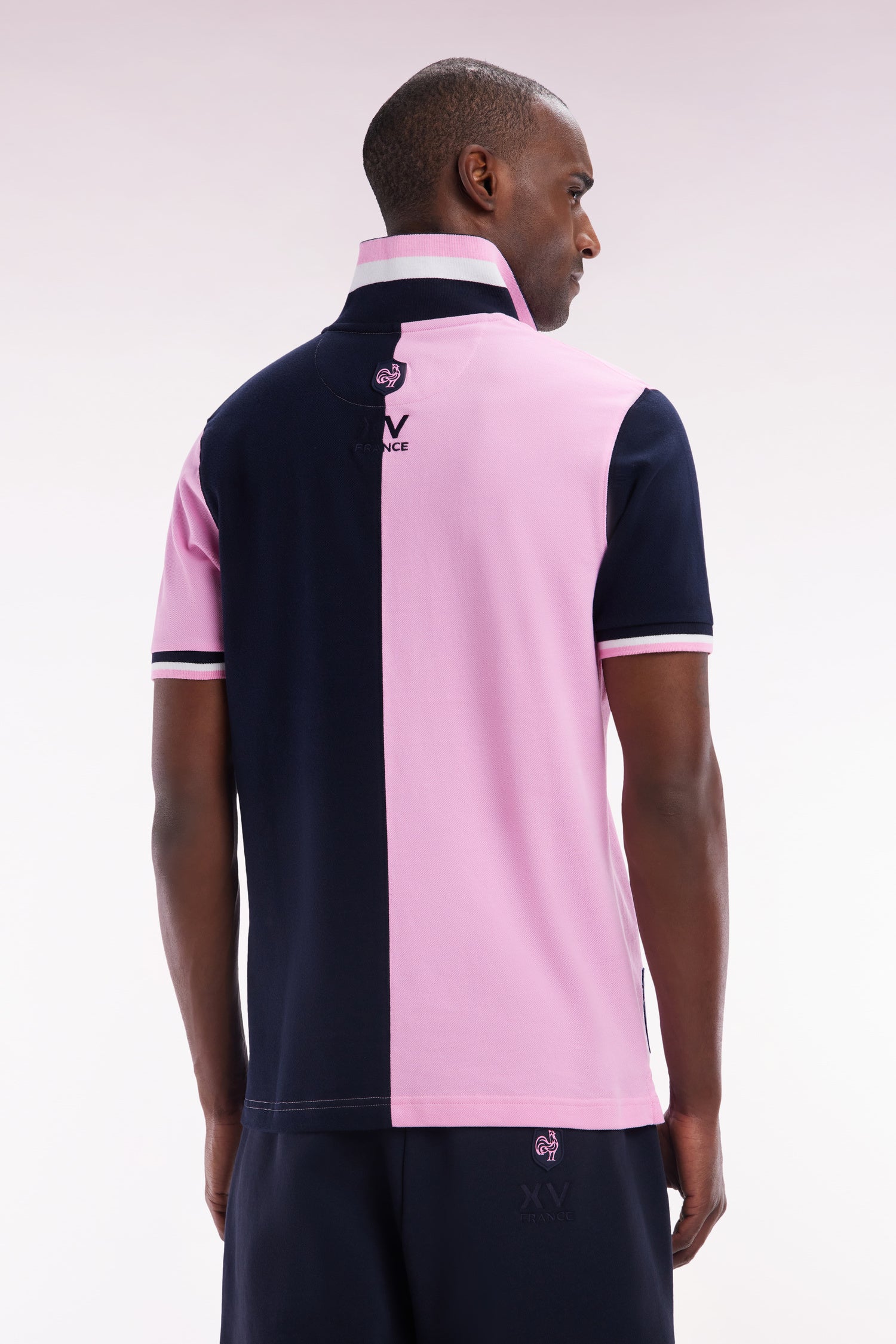 Polo à manches courtes en coton bicolore rose et marine coupe droite