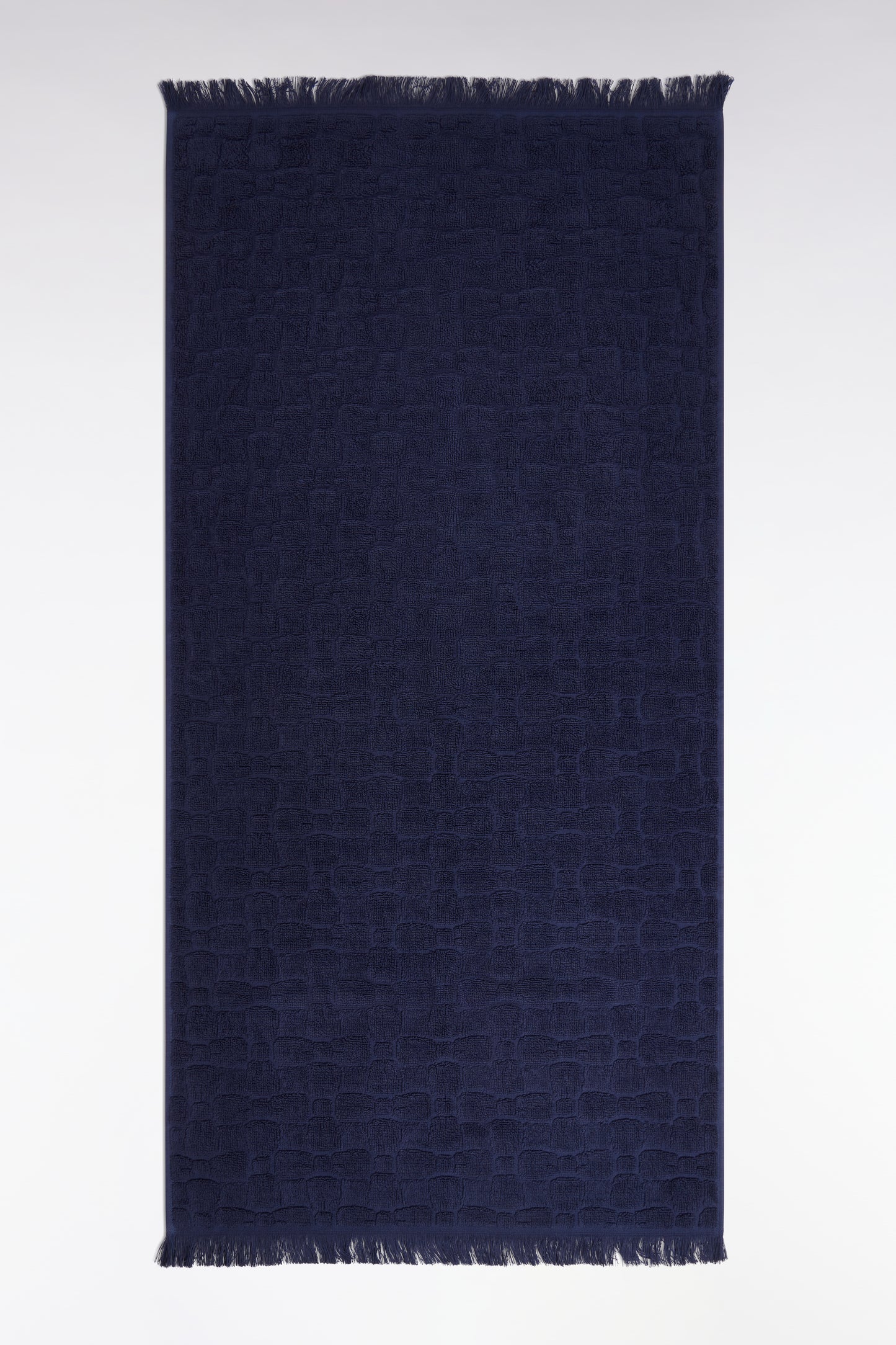 Serviette de toilette en coton marine à micromotifs nœuds papillon