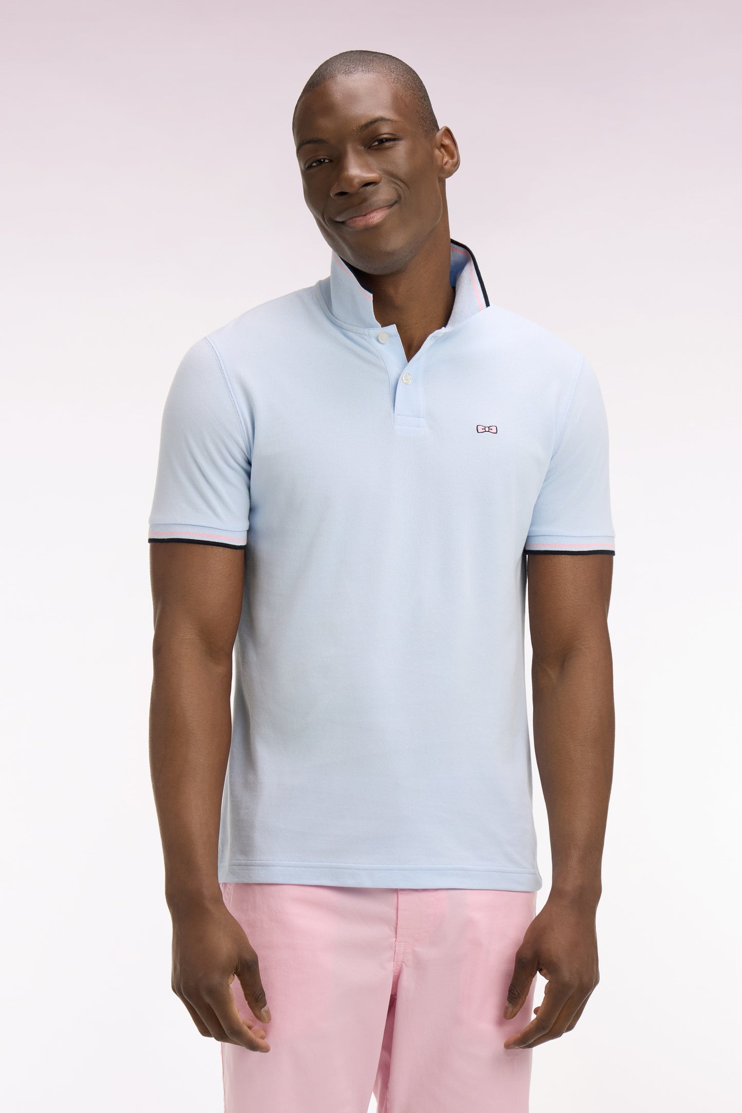 Short-sleeved polo shirt in sky cotton with striped details, regular fit