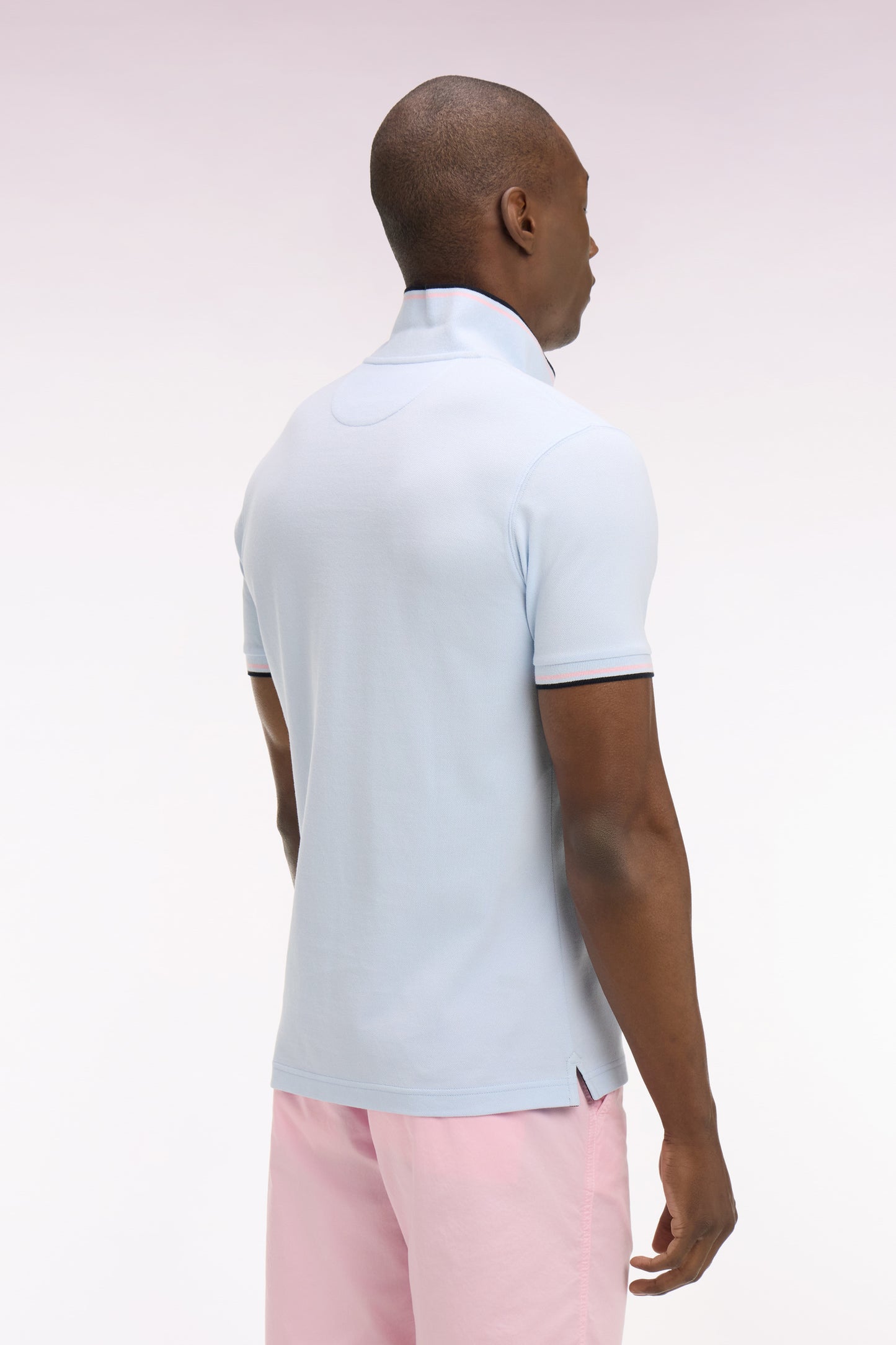 Short-sleeved polo shirt in sky cotton with striped details, regular fit