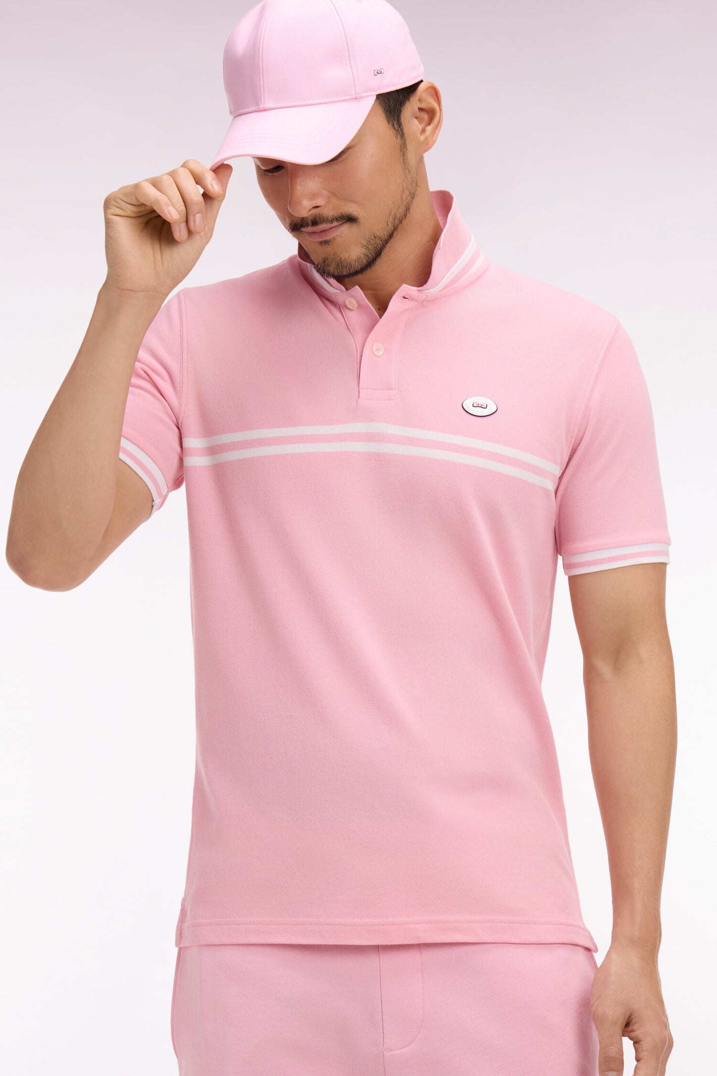 Polo à manches courtes en coton rose à rayures blanches coupe regular