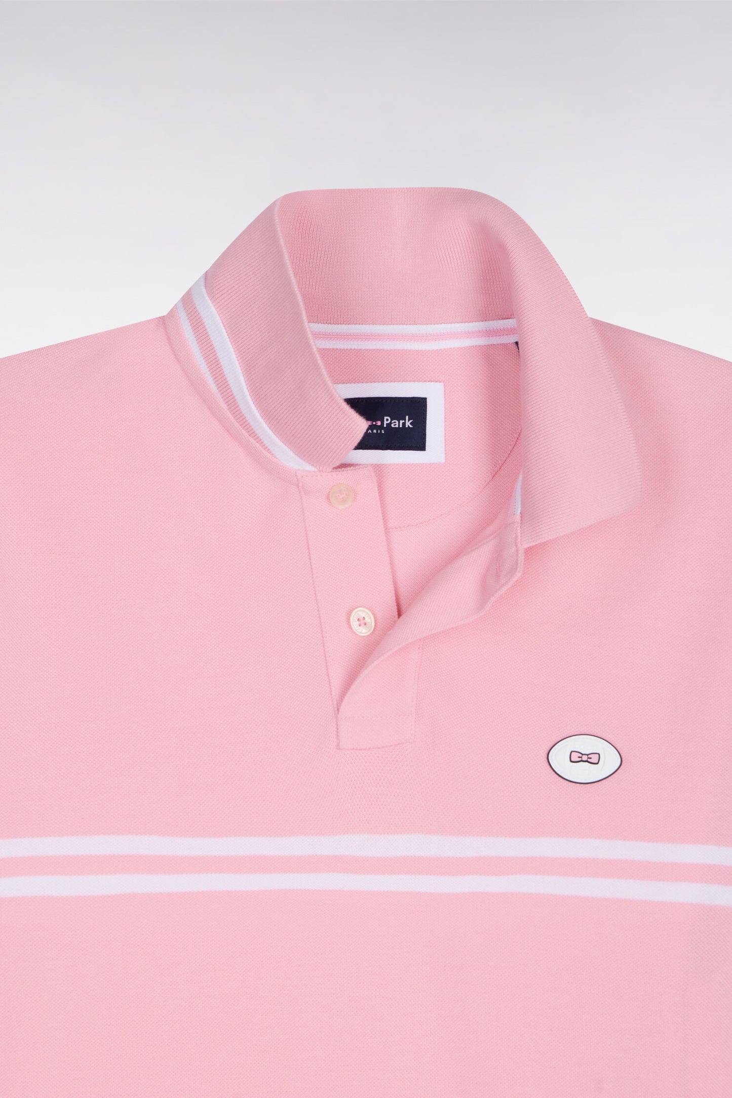 Polo à manches courtes en coton rose à rayures blanches coupe regular