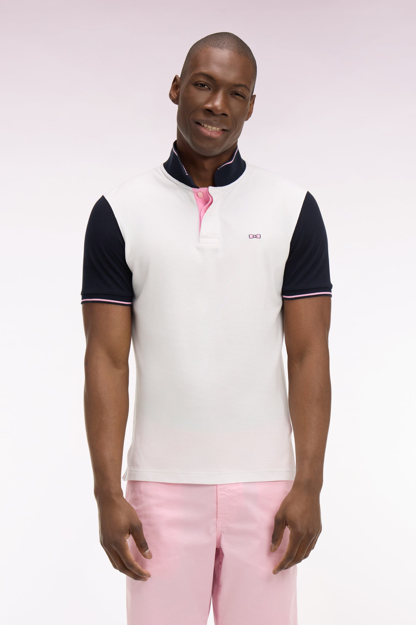 Short-sleeved white cotton pique polo shirt with back embroidery