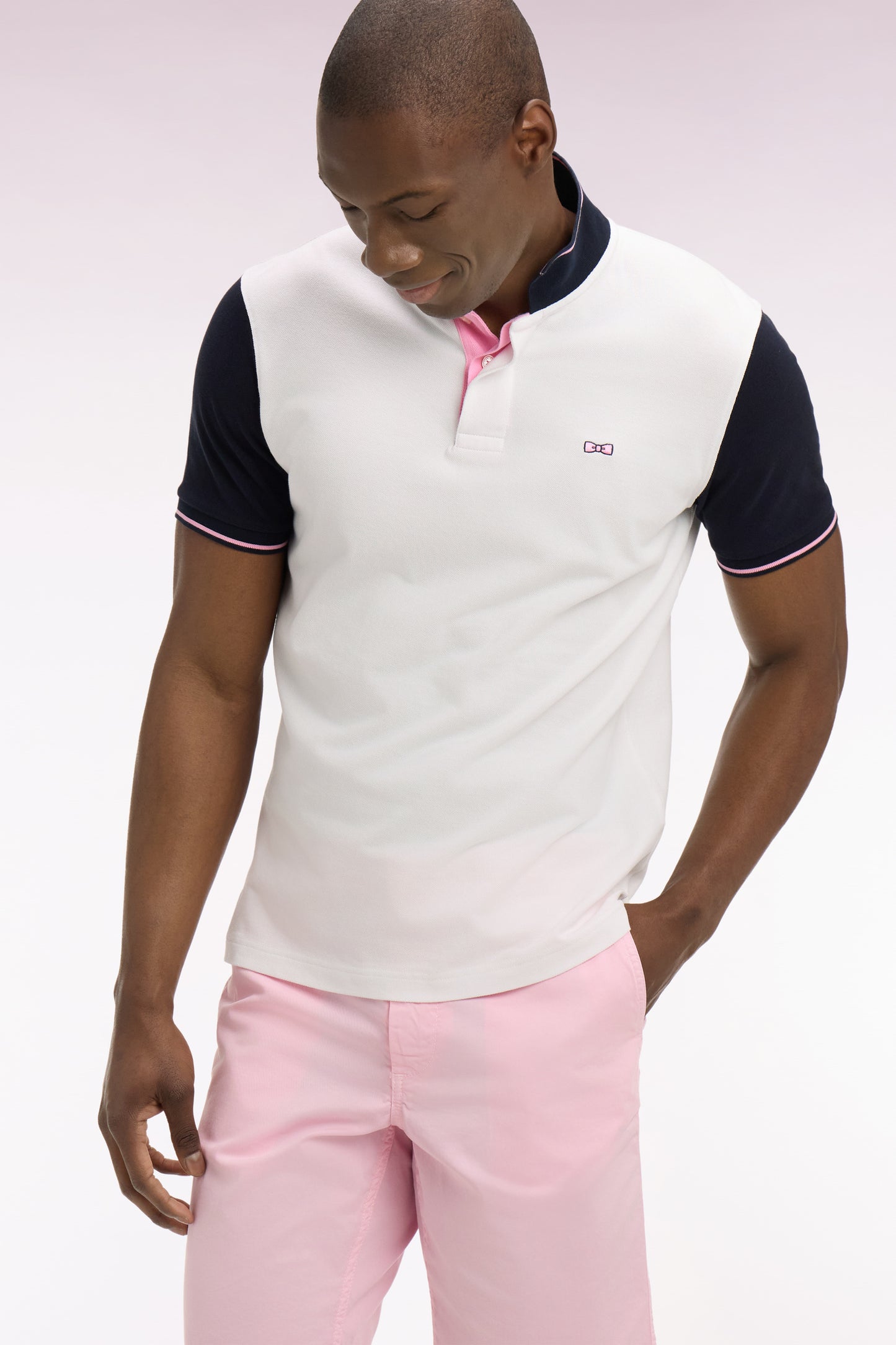 Short-sleeved white cotton pique polo shirt with back embroidery