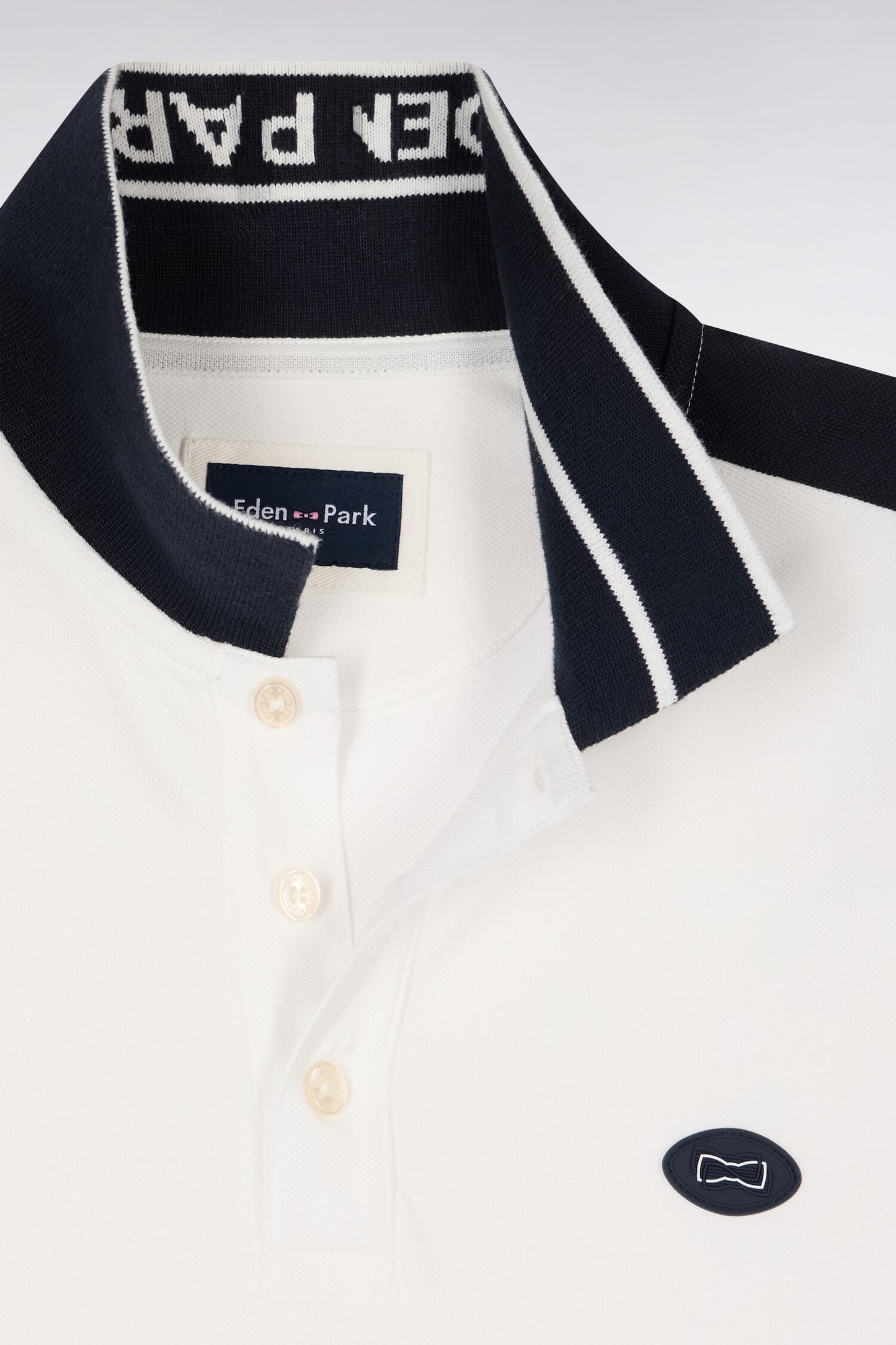 Polo à manches courtes en piqué coton blanc à découpes marine